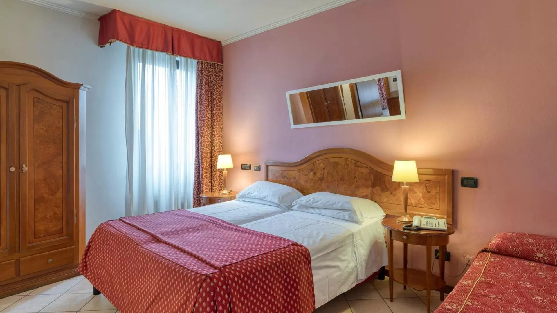 Photo of the whole room, Bed in Primotel Brescia