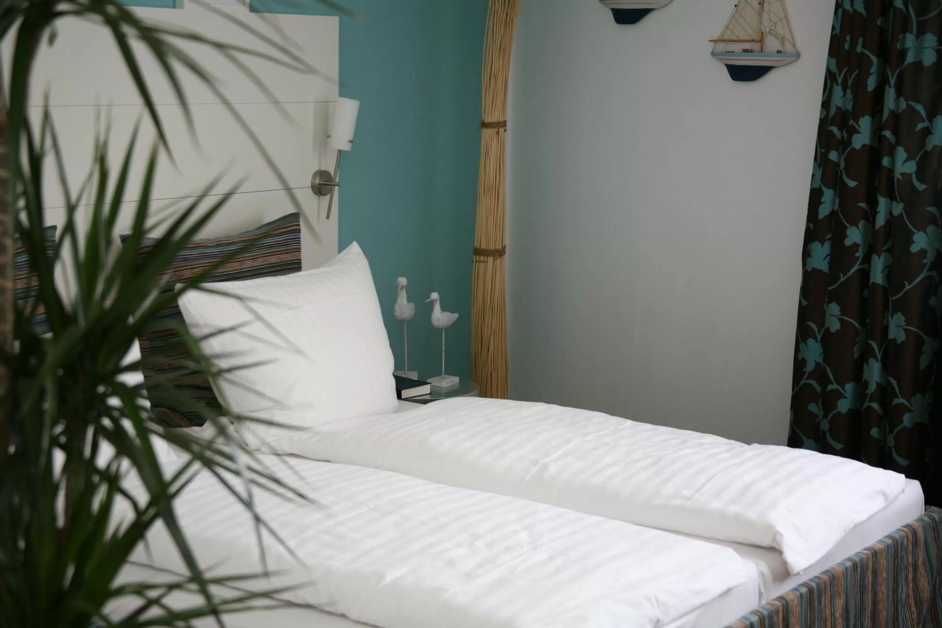 Bed in Hotel Wilhelm Busch