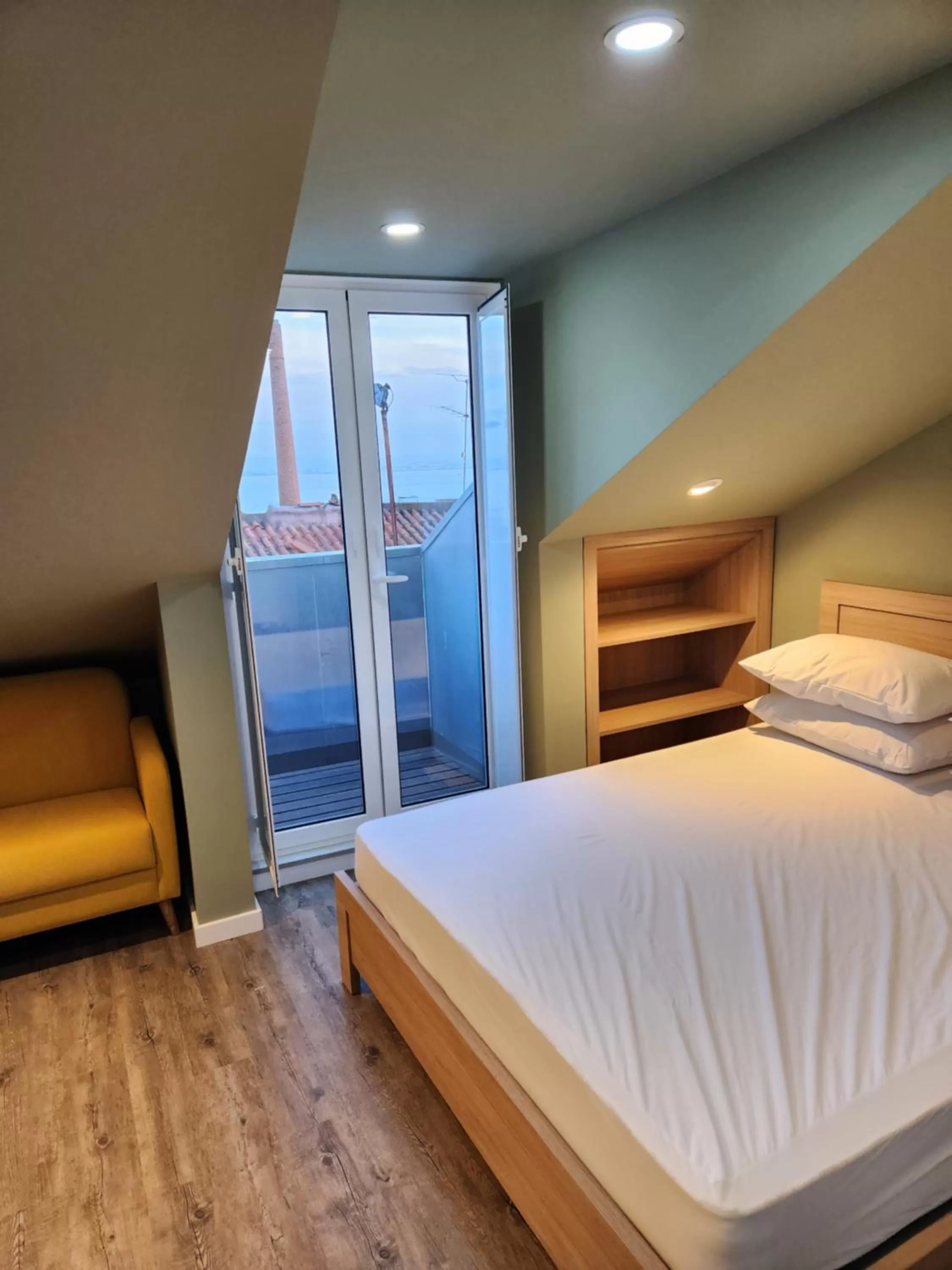 Bed in Loios Studios and Apartments