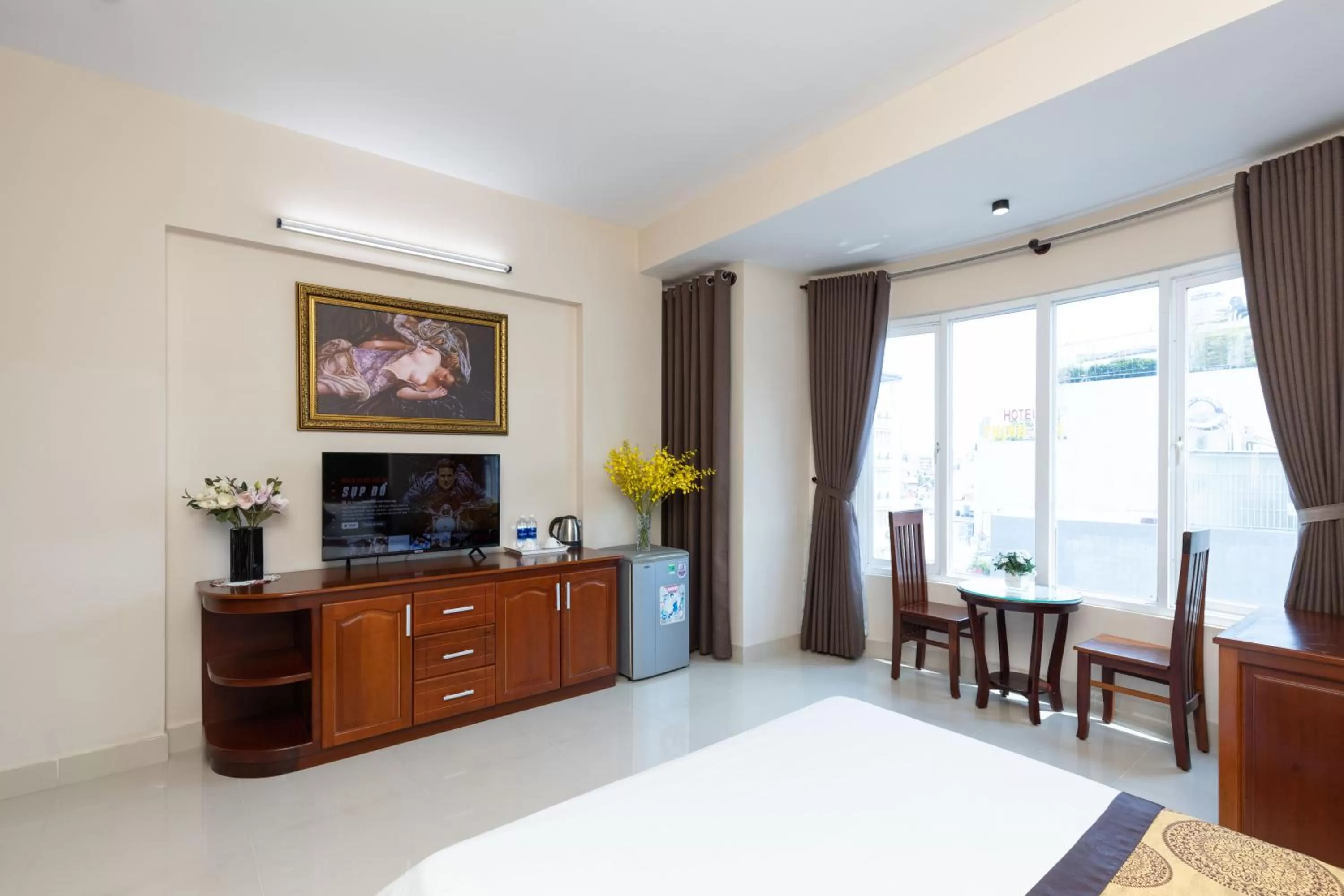 TV and multimedia in Queen Garden Hotel & Apartment