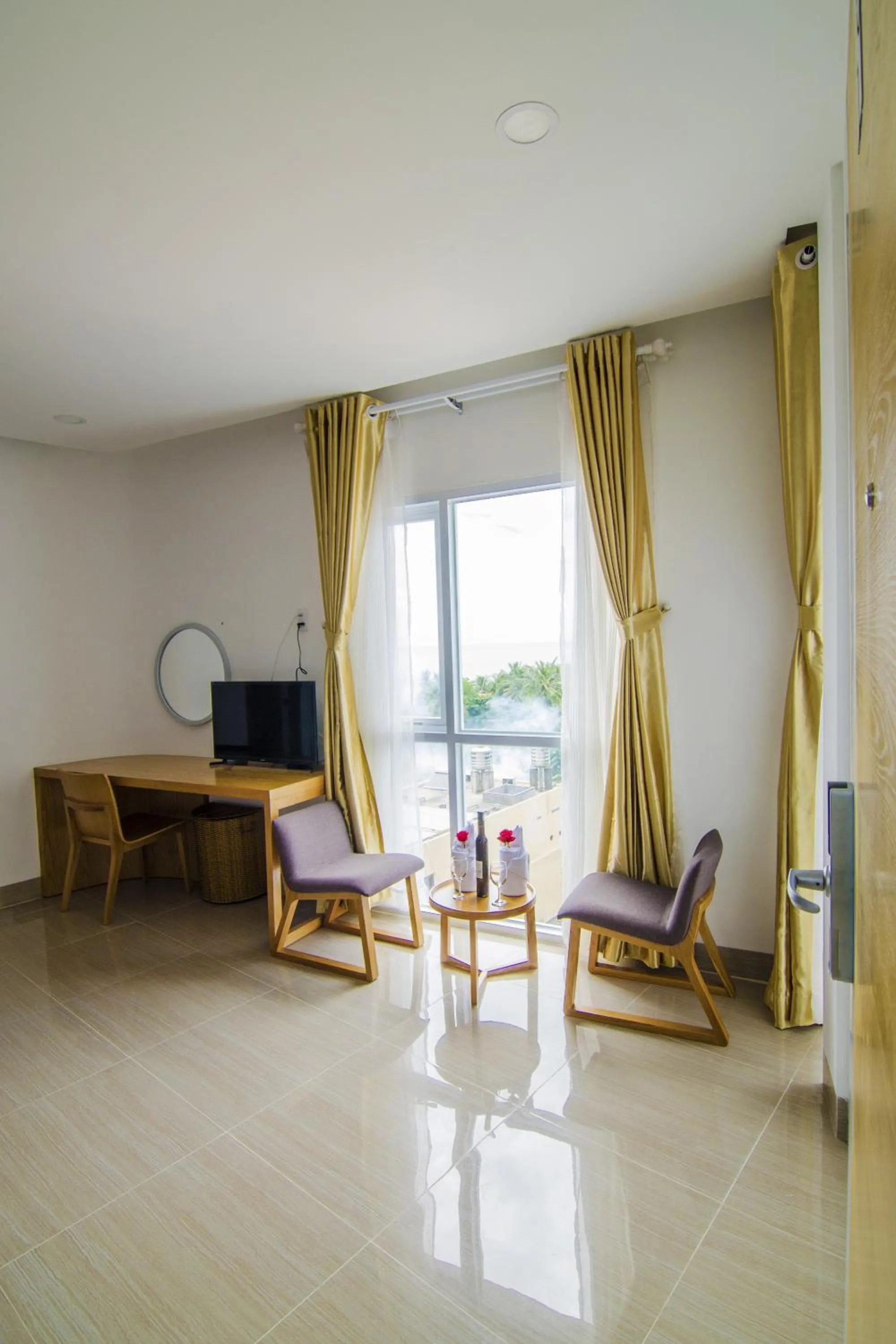 Bed, Seating Area in Sailing Hotel Phú Quốc Island