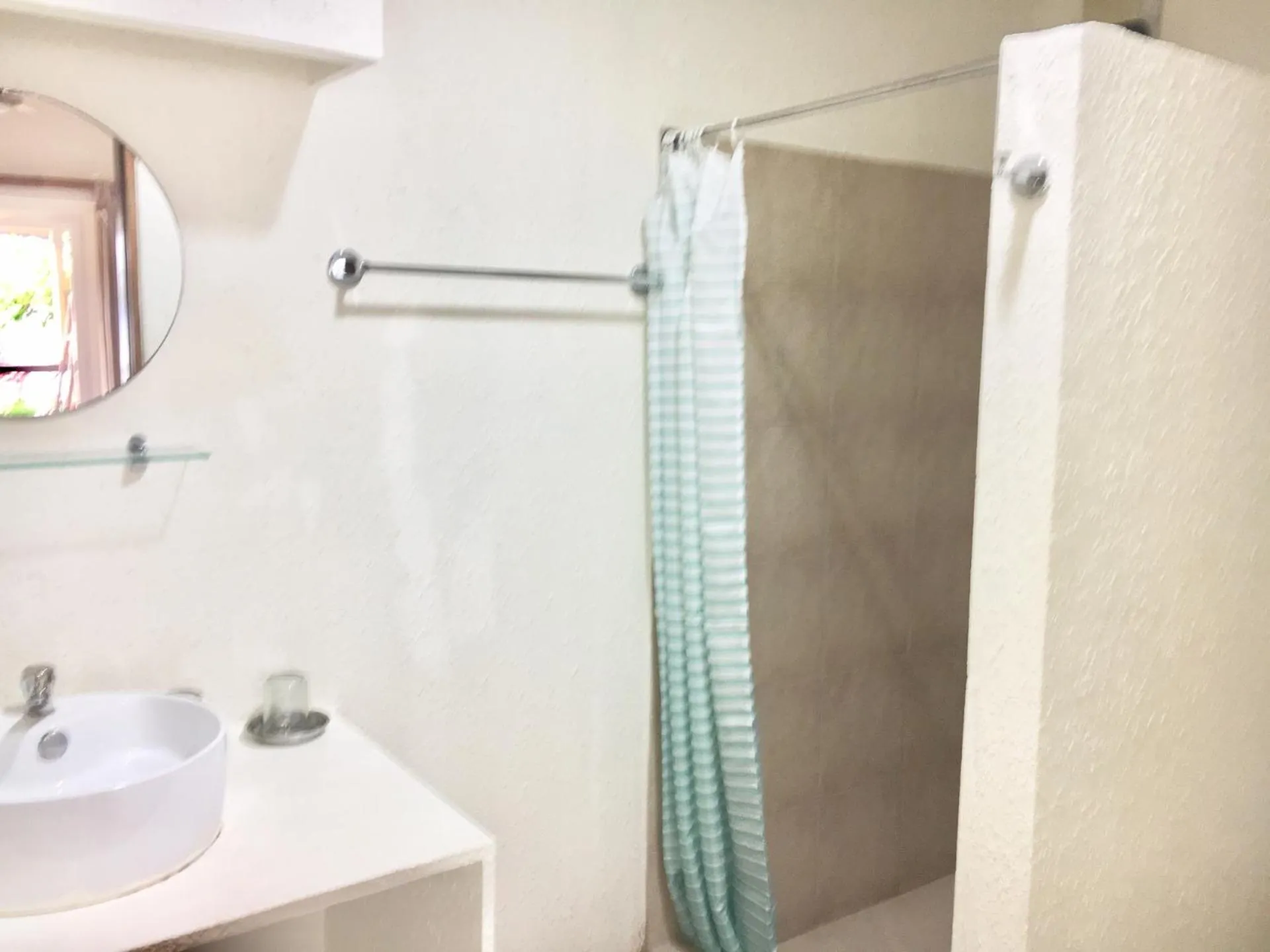 Shower, Bathroom in Sunset At Aninuan Beach Resort