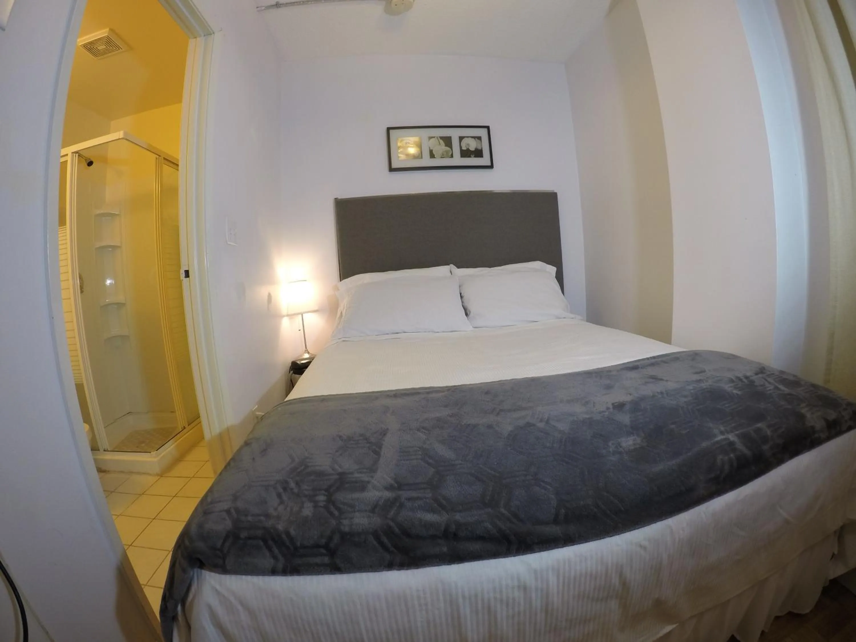 Bed in Saint Lawrence Residences and Suites