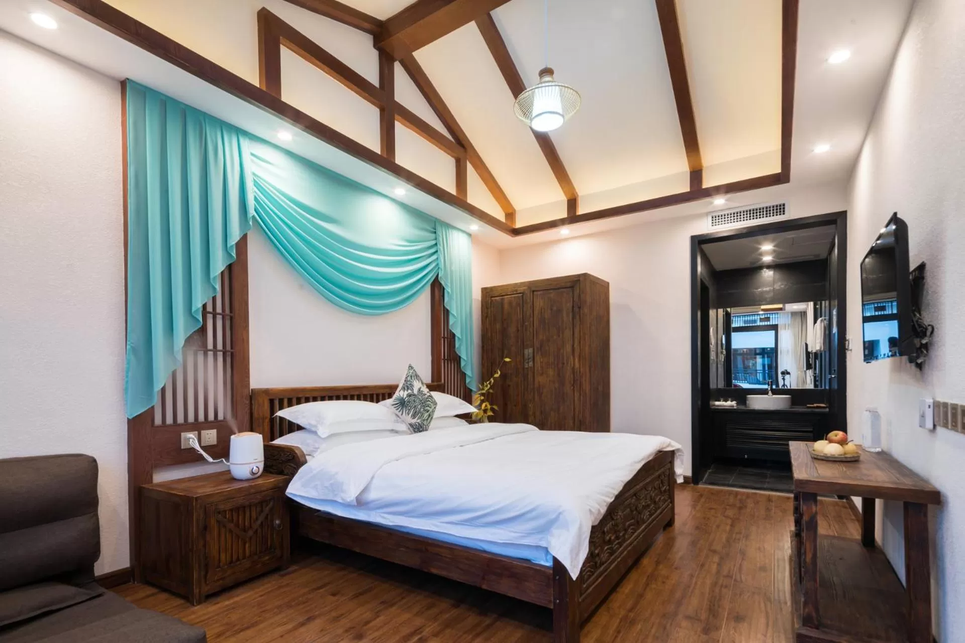 Bed in Lijiang Gemmer Hotel