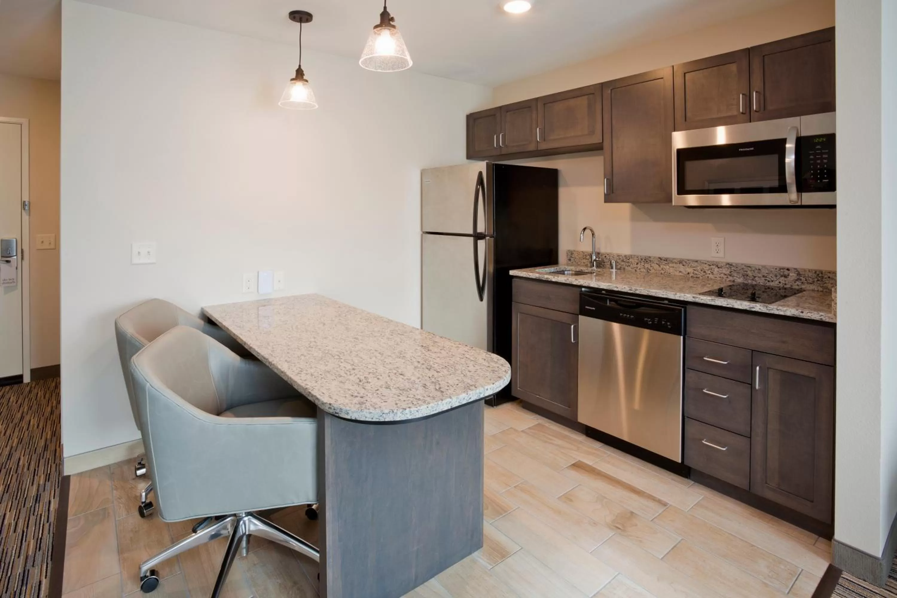 Kitchen or kitchenette in GrandStay Hotel & Suites