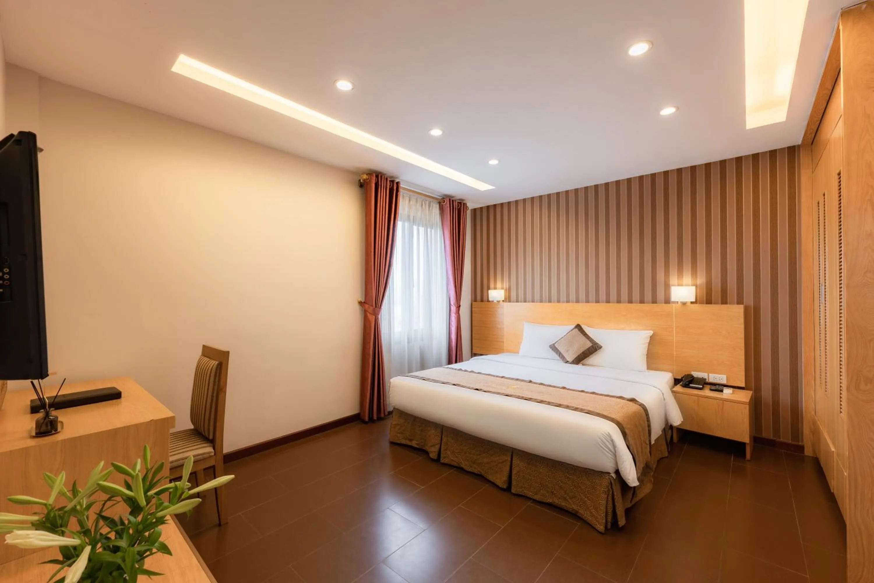 Bed in Riverside Hanoi Hotel