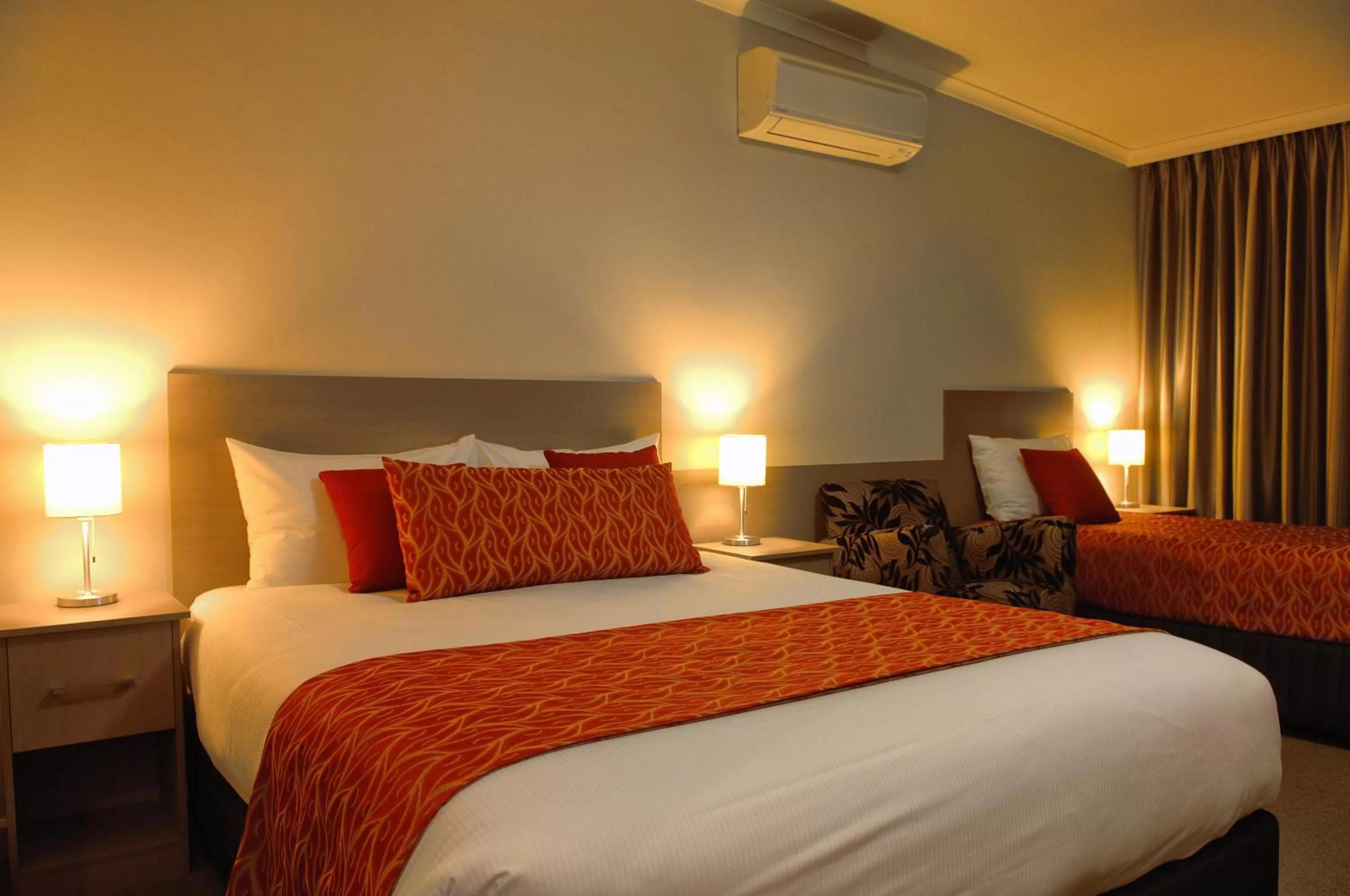 Bed in Tower Motor Inn