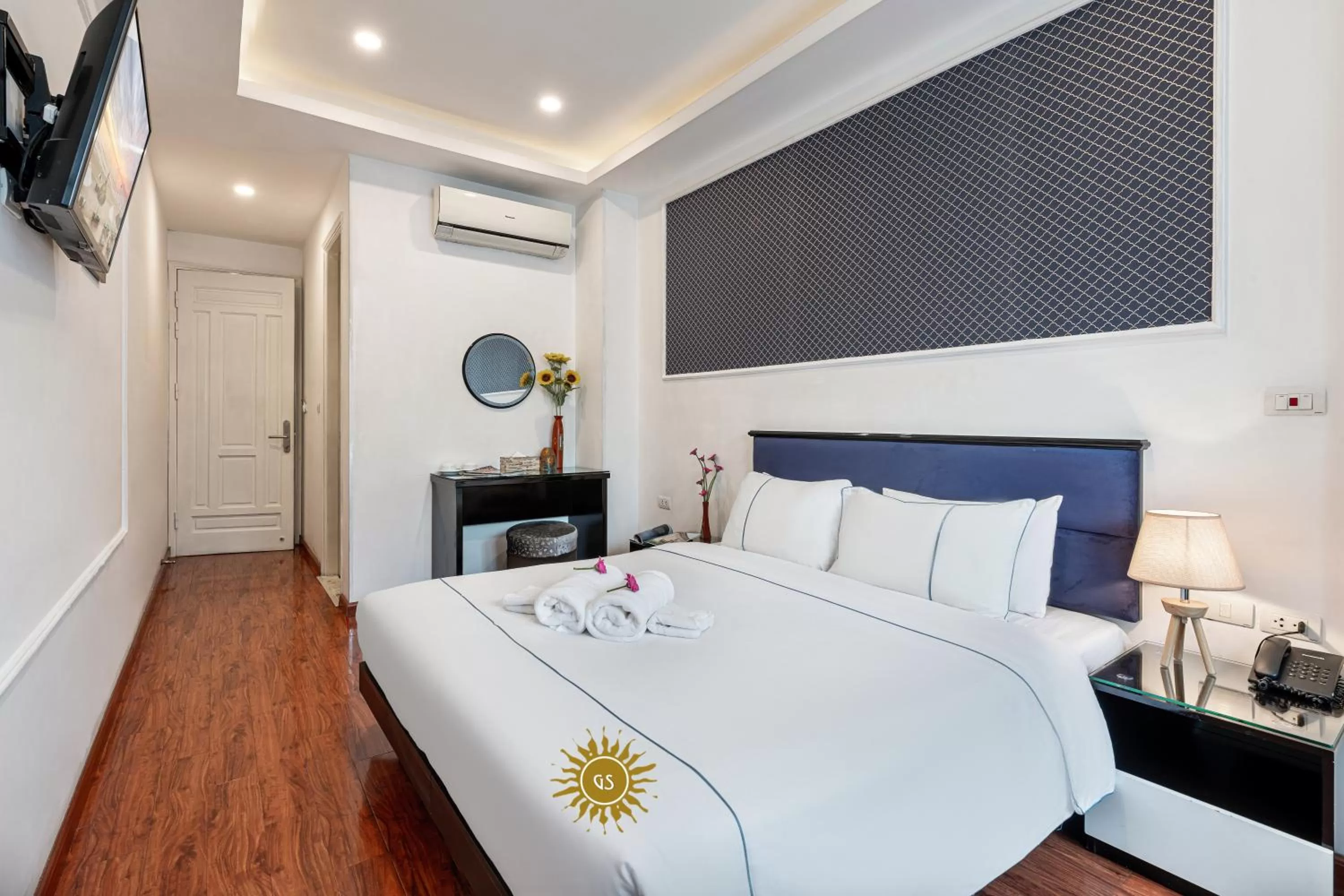 Bed in Golden Sun Hotel