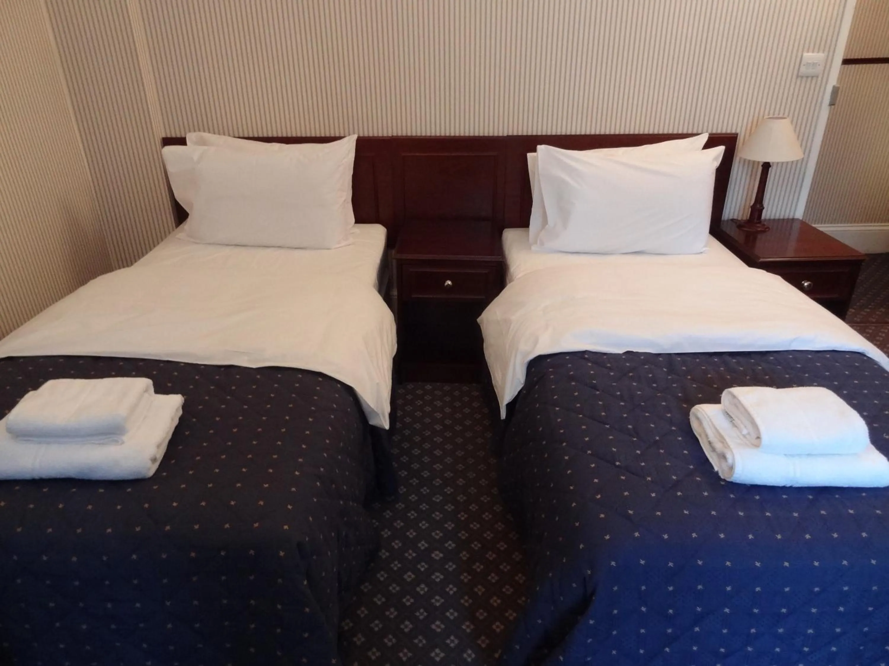 Bed in Regency House Hotel