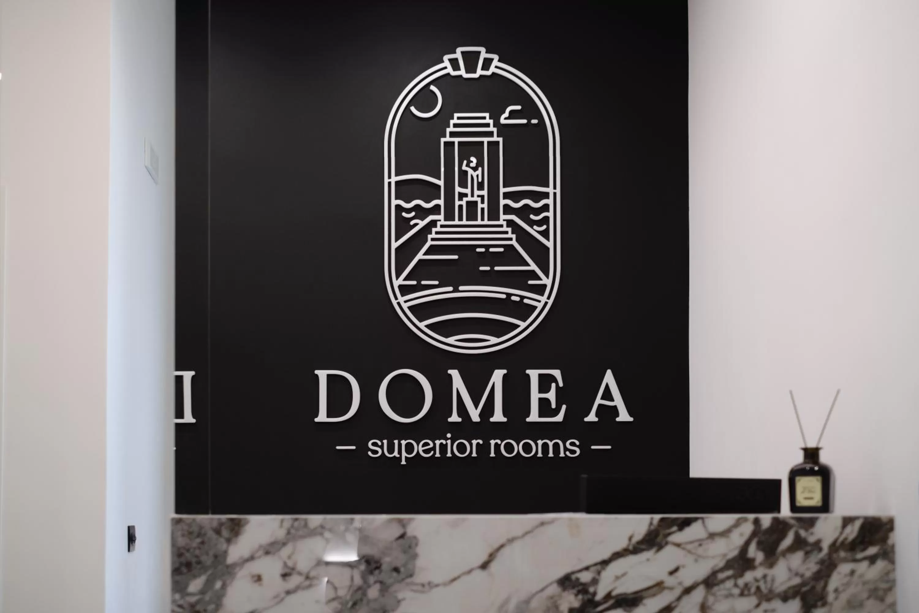 Property logo or sign in Domea Superior Rooms Bed and Breakfast