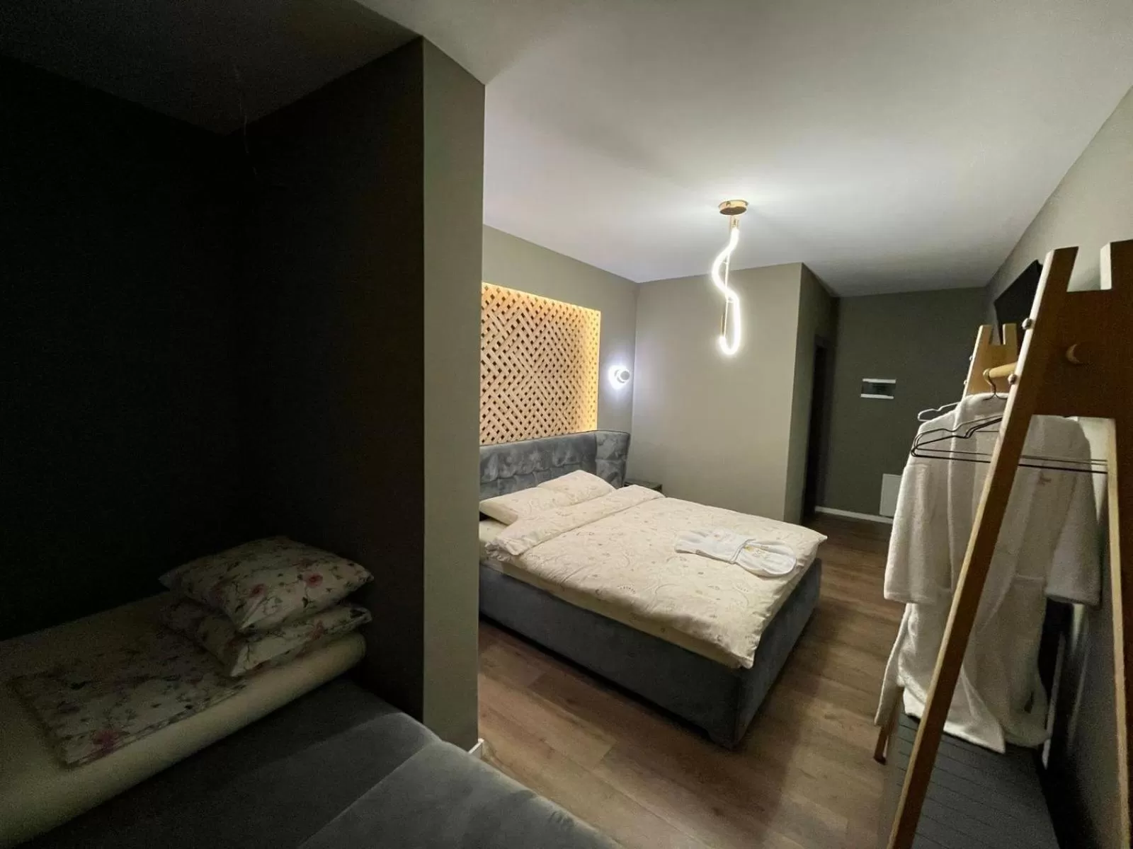 Bed in GRAND JNK Boutique Hotel