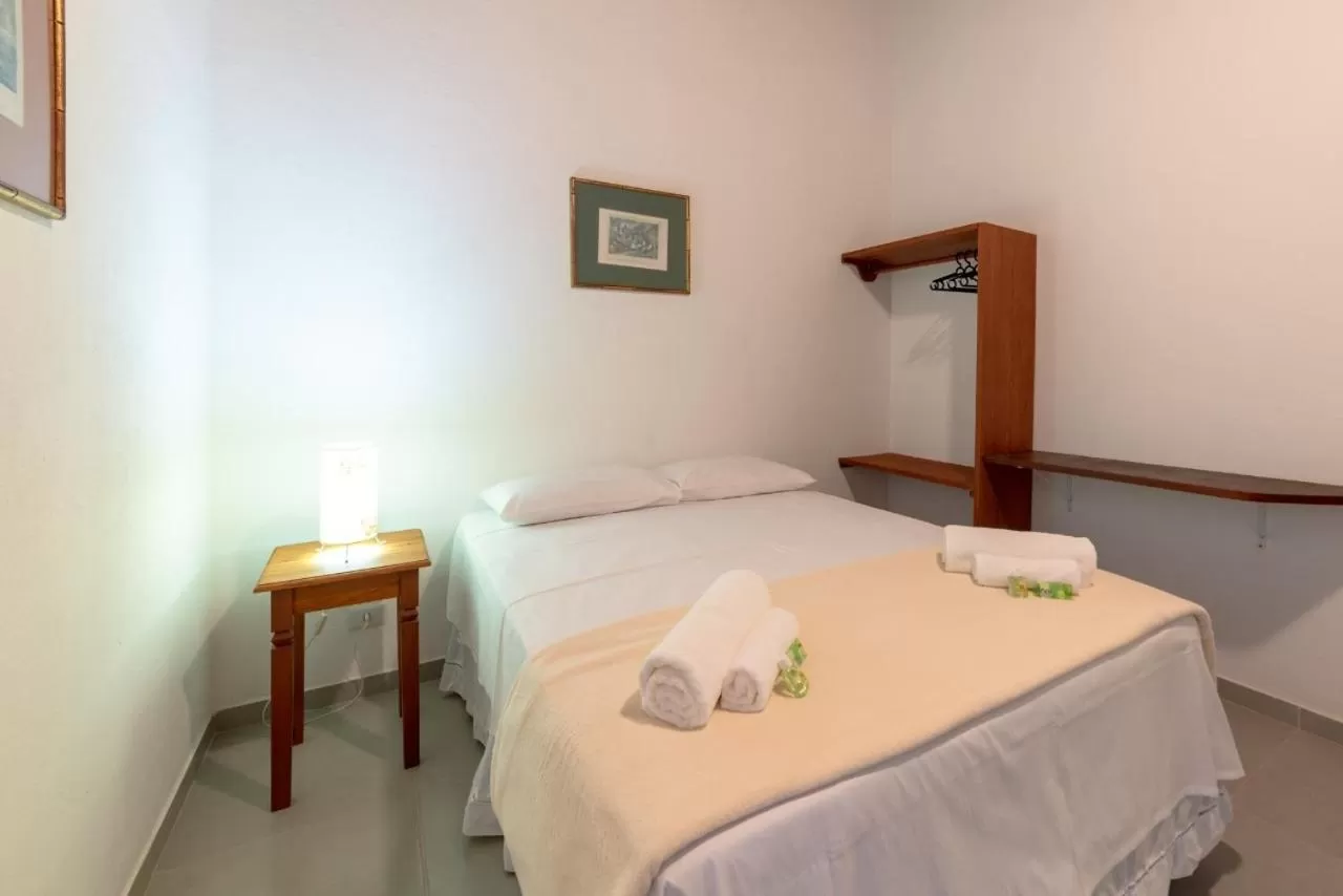 Bed in Pousada Portal de Paraty