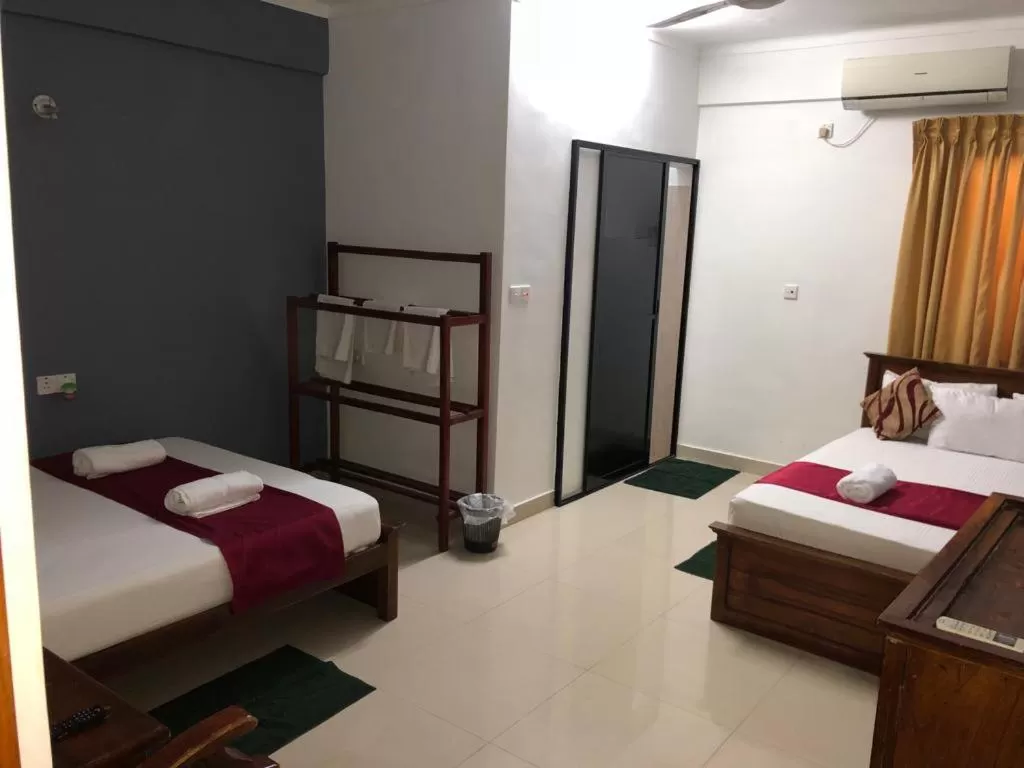 Bed in Yal's Town Inn