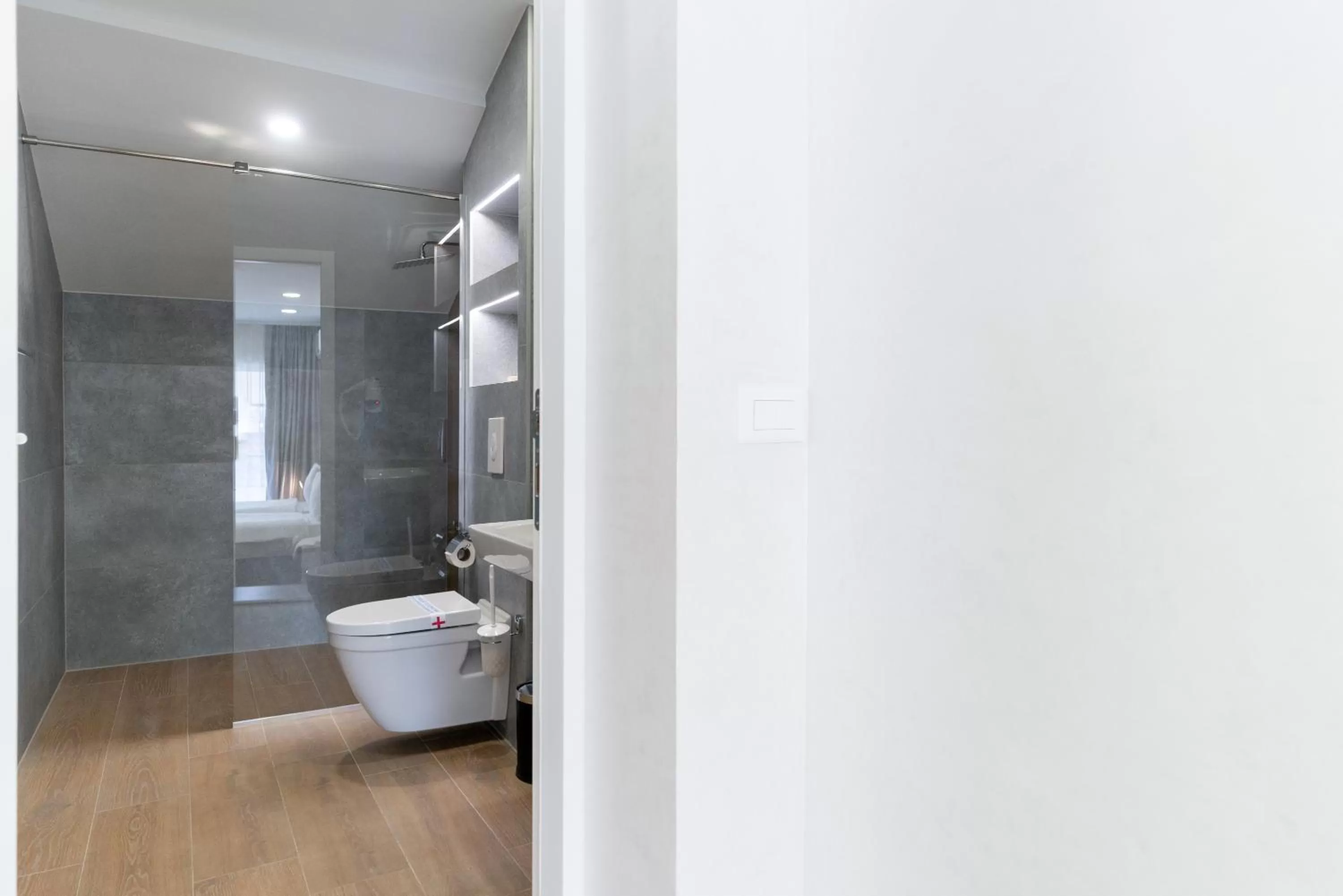 Bathroom in Ornament Hotel and Apartments