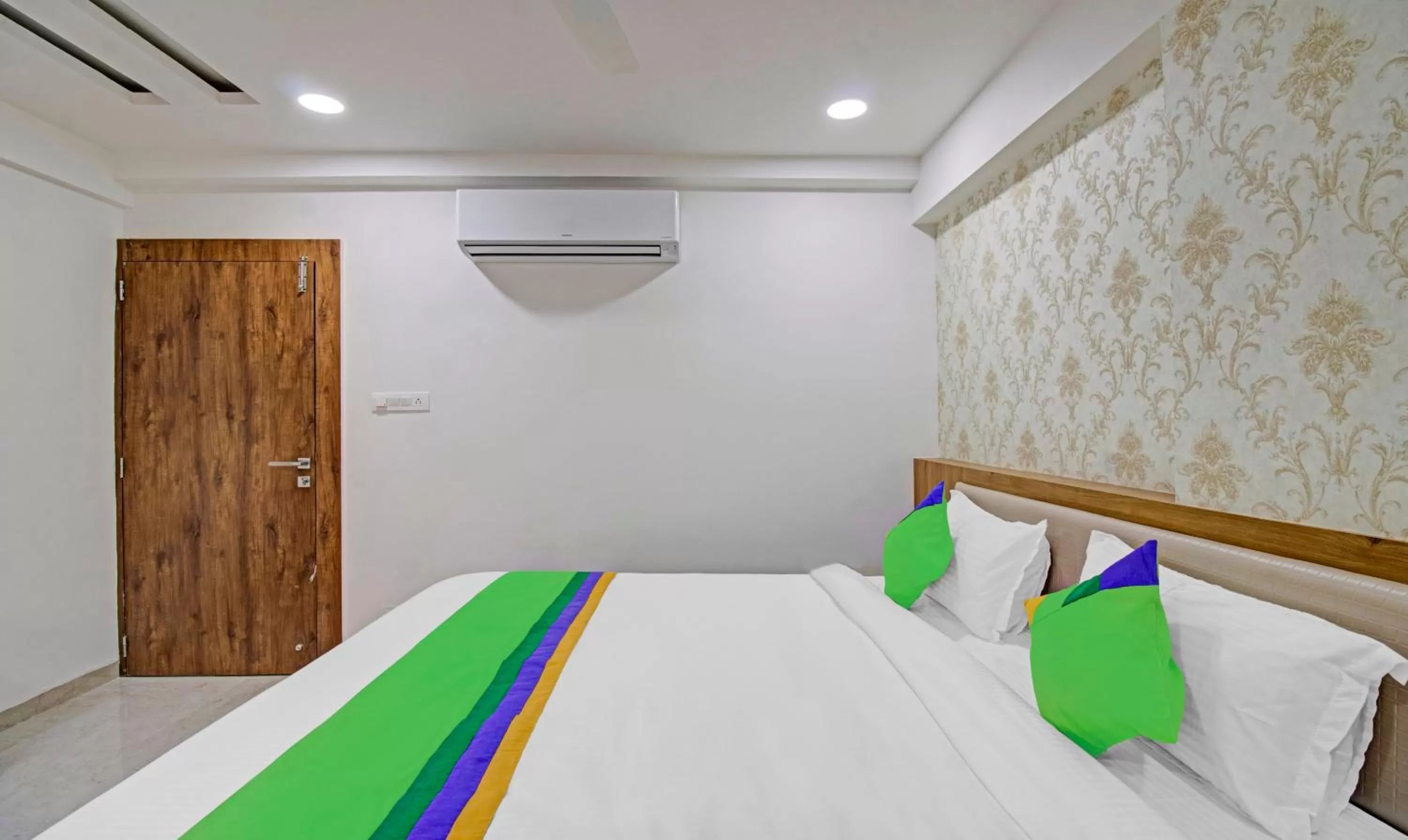 Bedroom, Bed in Treebo Chandraprasth Residency