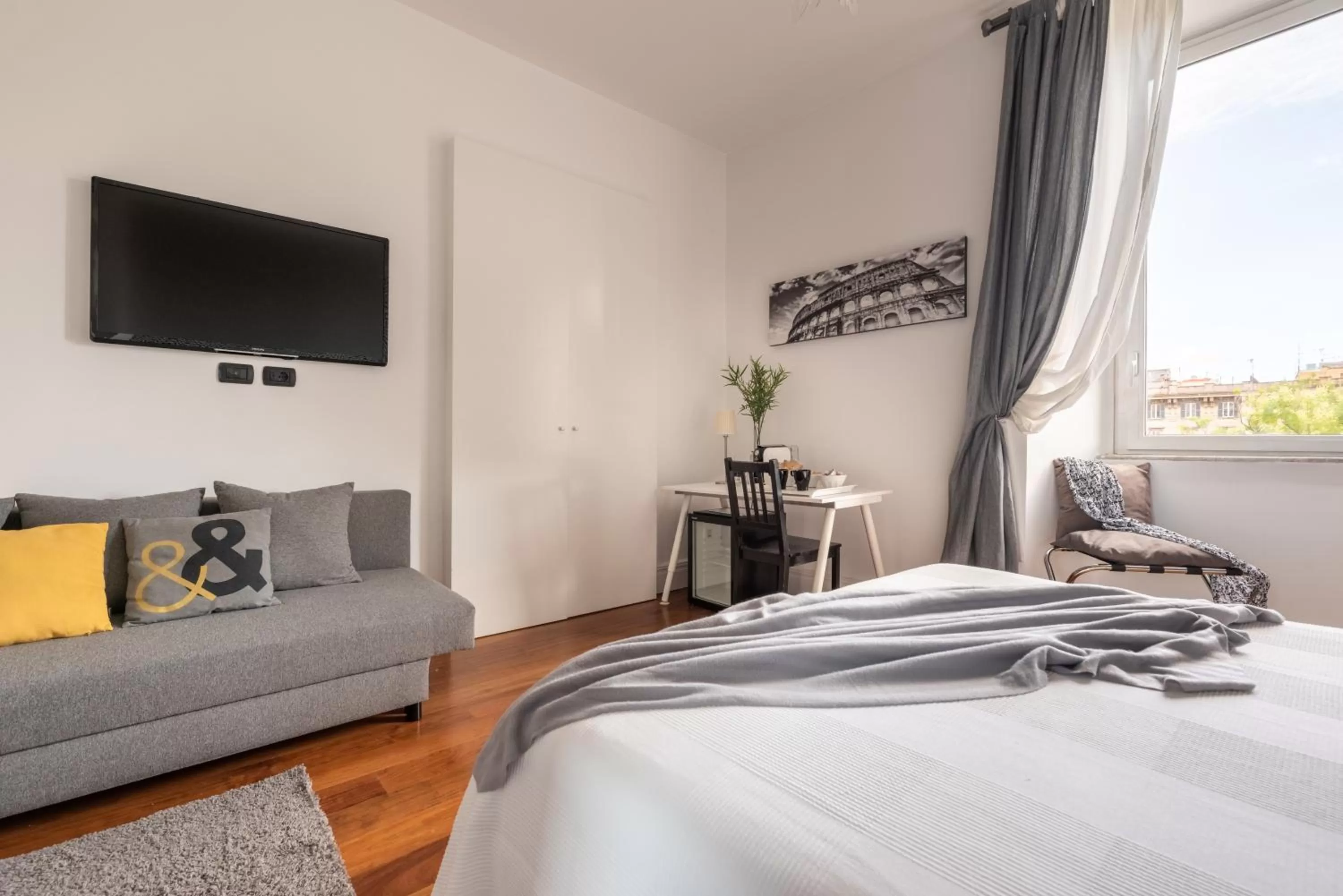 Bedroom, TV/Entertainment Center in Suite 36 - NEW OPENING