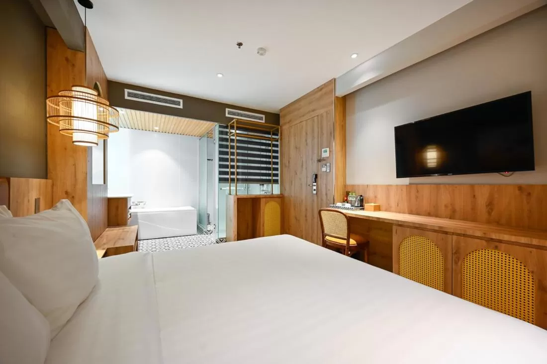 Bed in La Opera Saigon Hotel