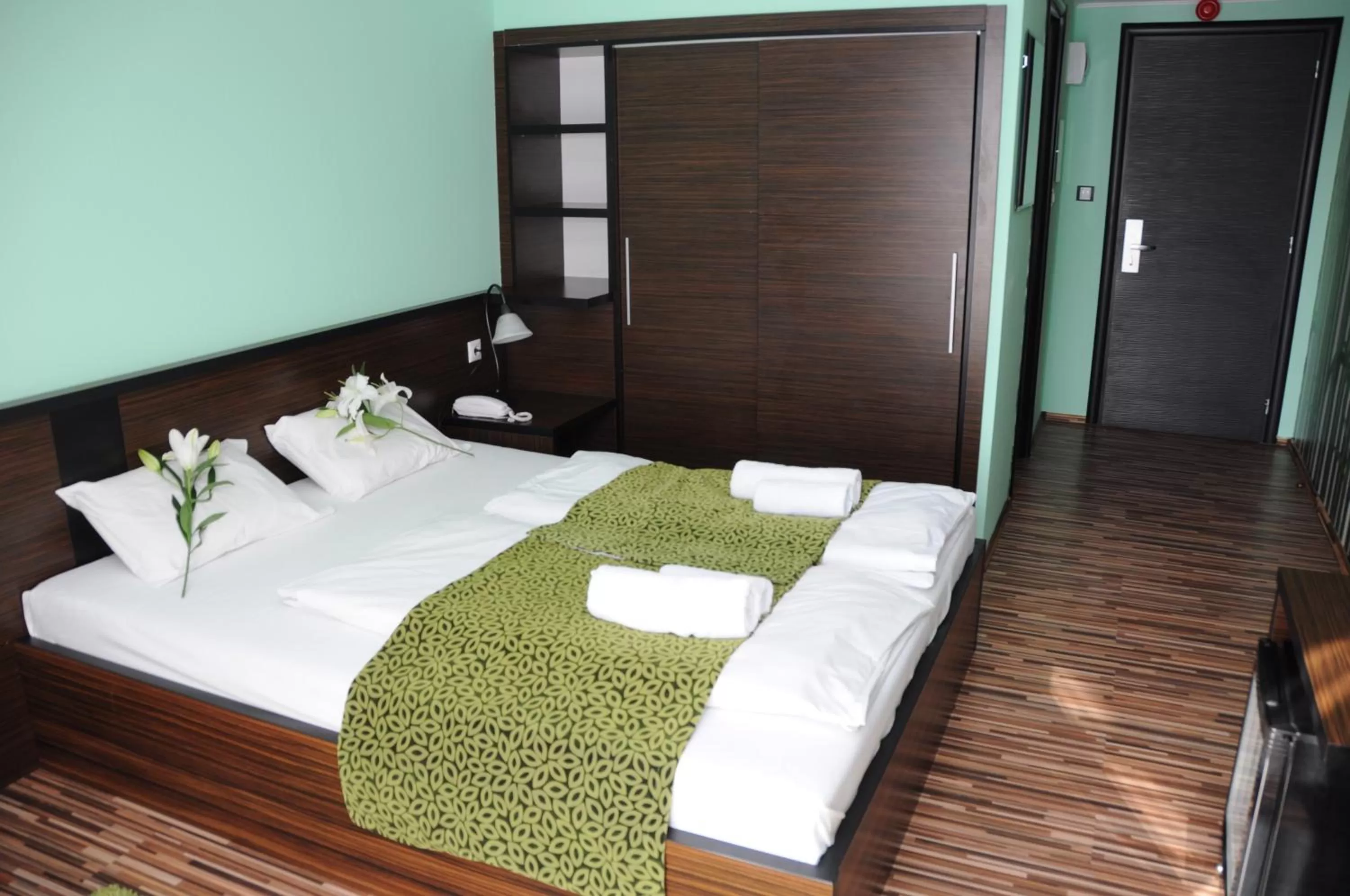 Bed in Green Hotel Budapest