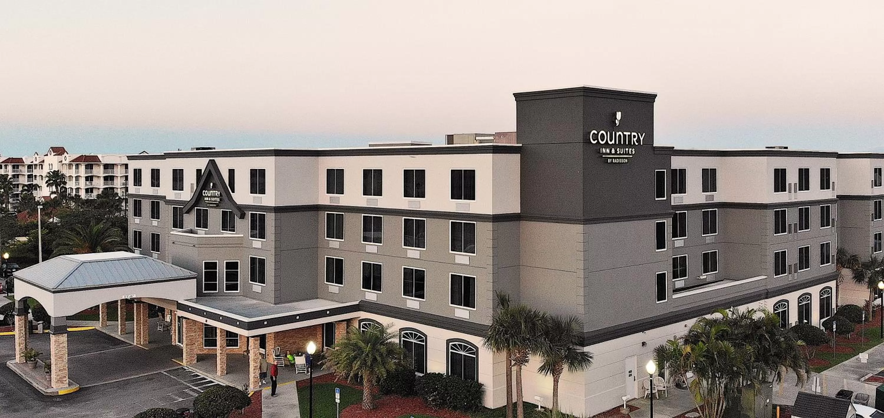 Property building in Country Inn & Suites by Radisson, Port Canaveral, FL