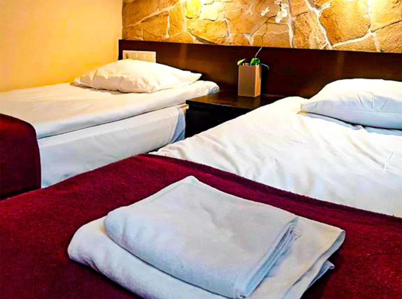 Bed in GRONO Apartamenty