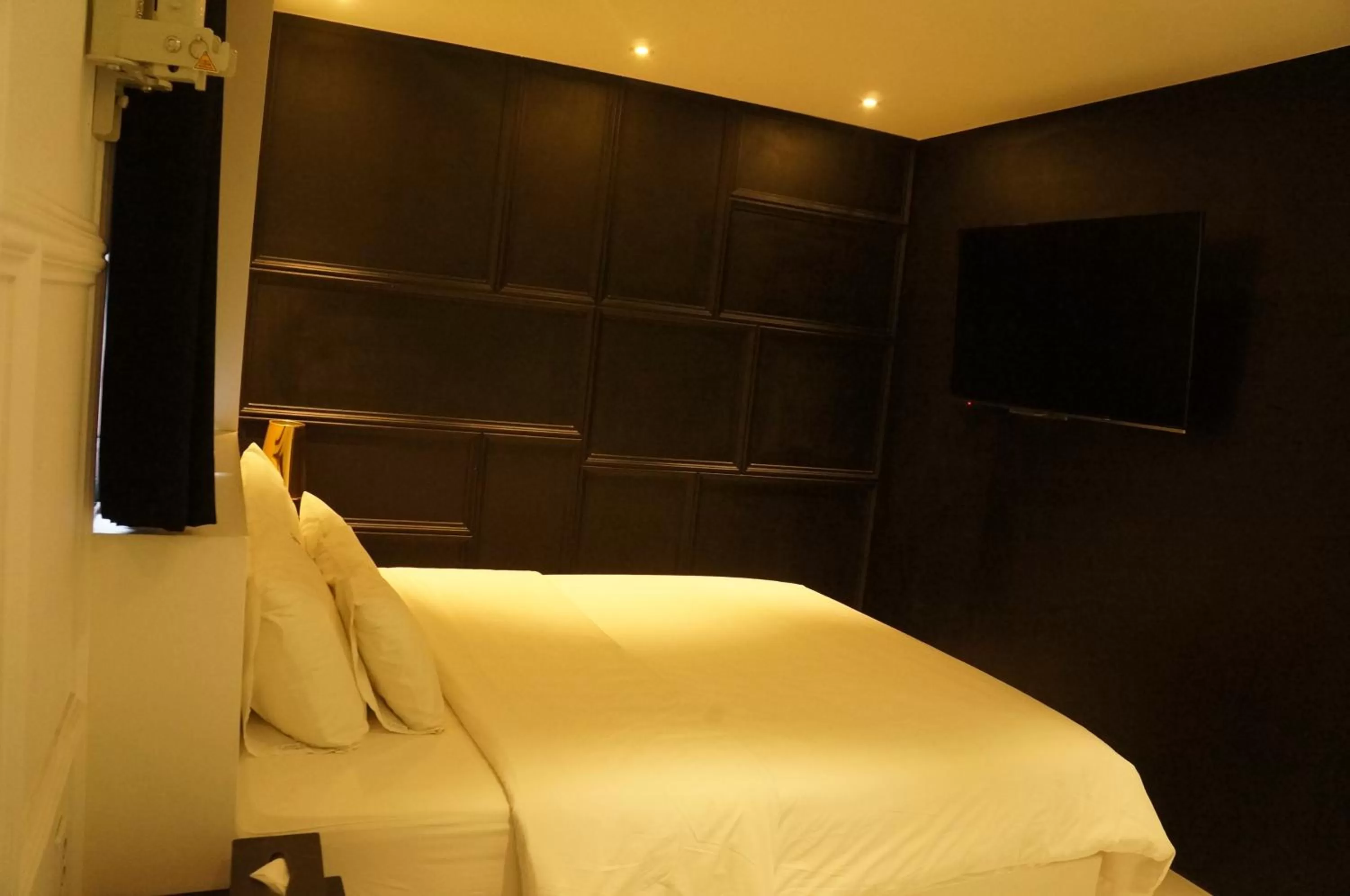 Bed in SOYU Hotel