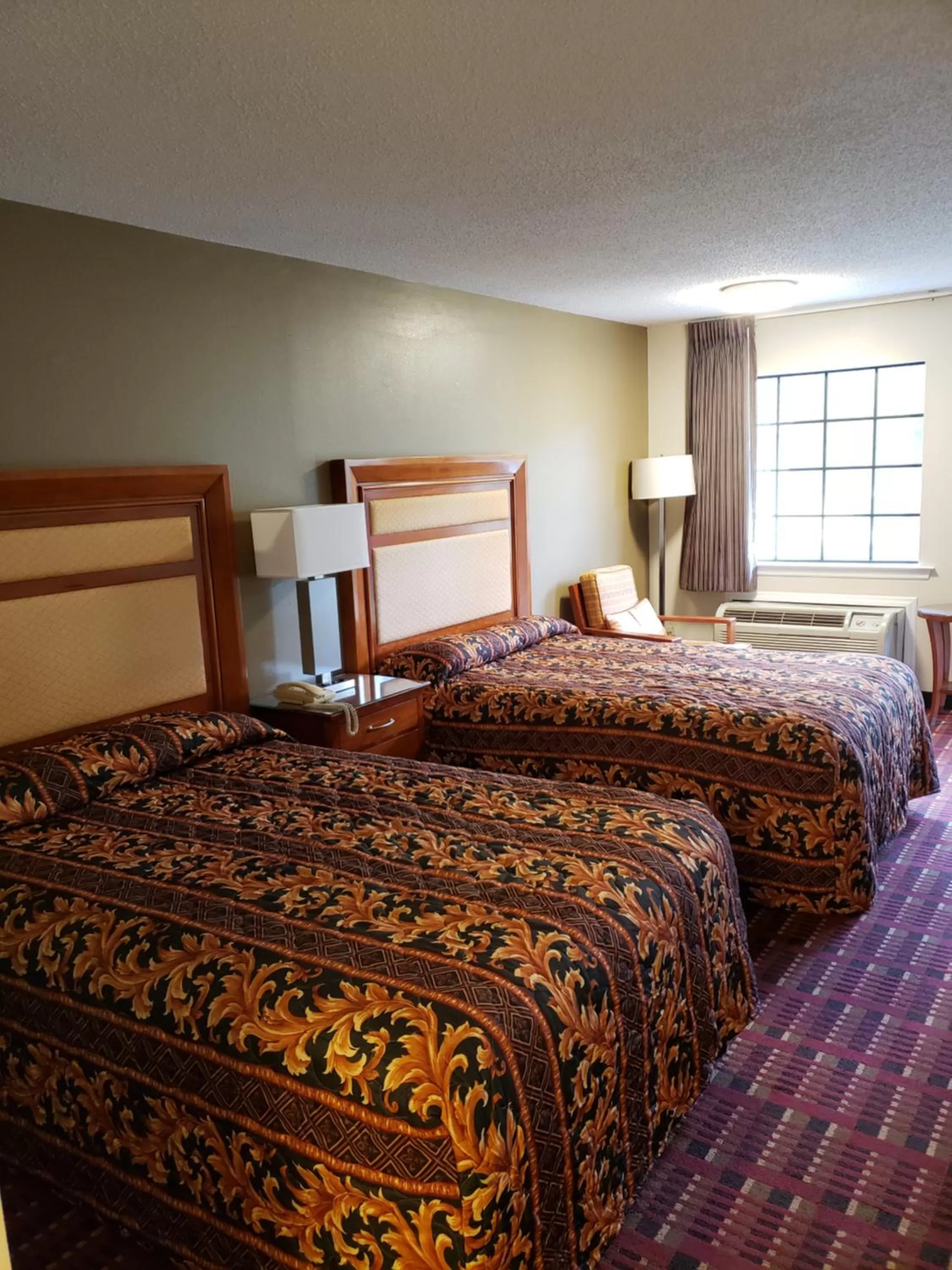 Bed in Peach Tree Inn