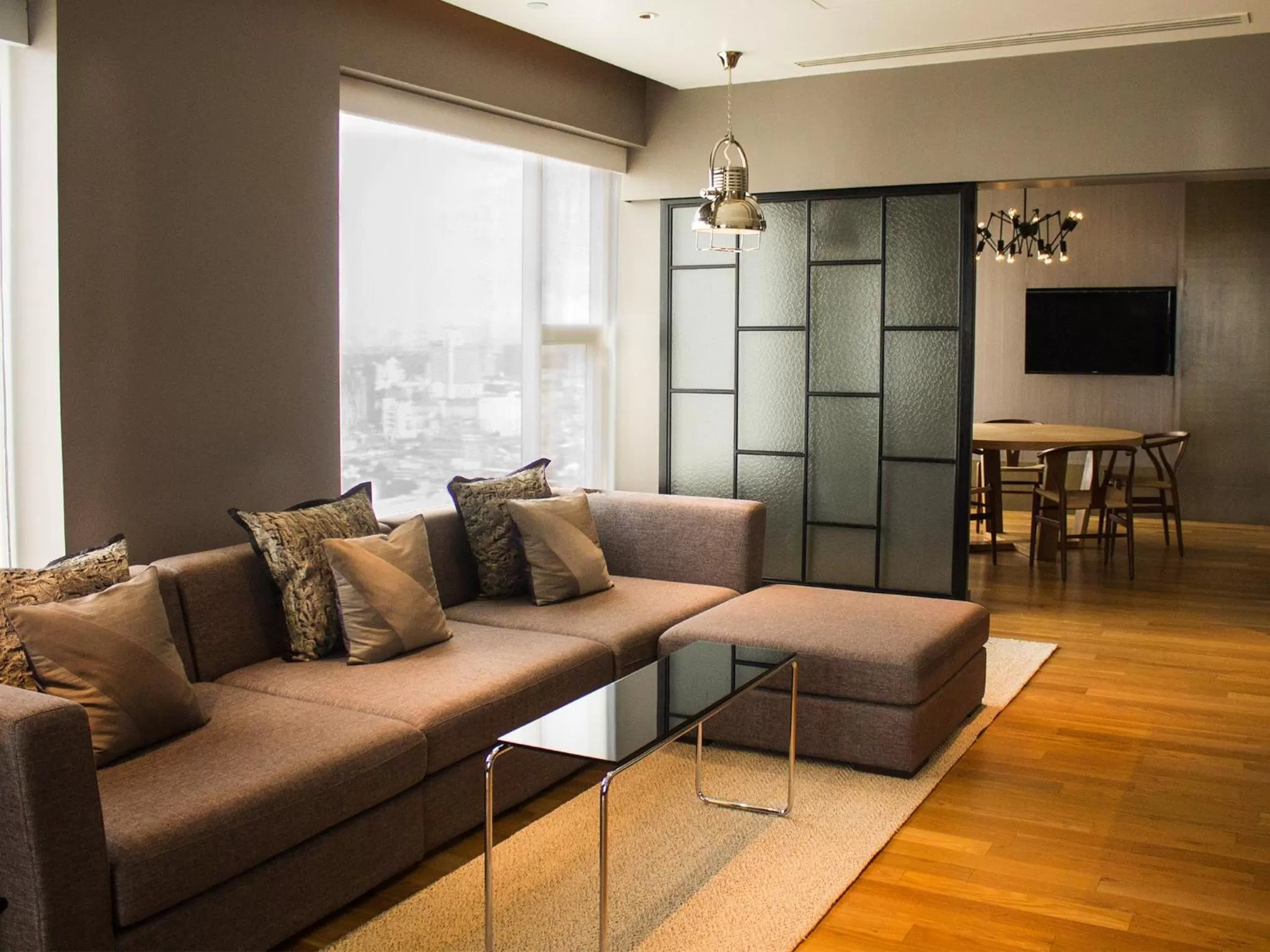 Living room in Mode Sathorn Hotel - SHA Extra Plus