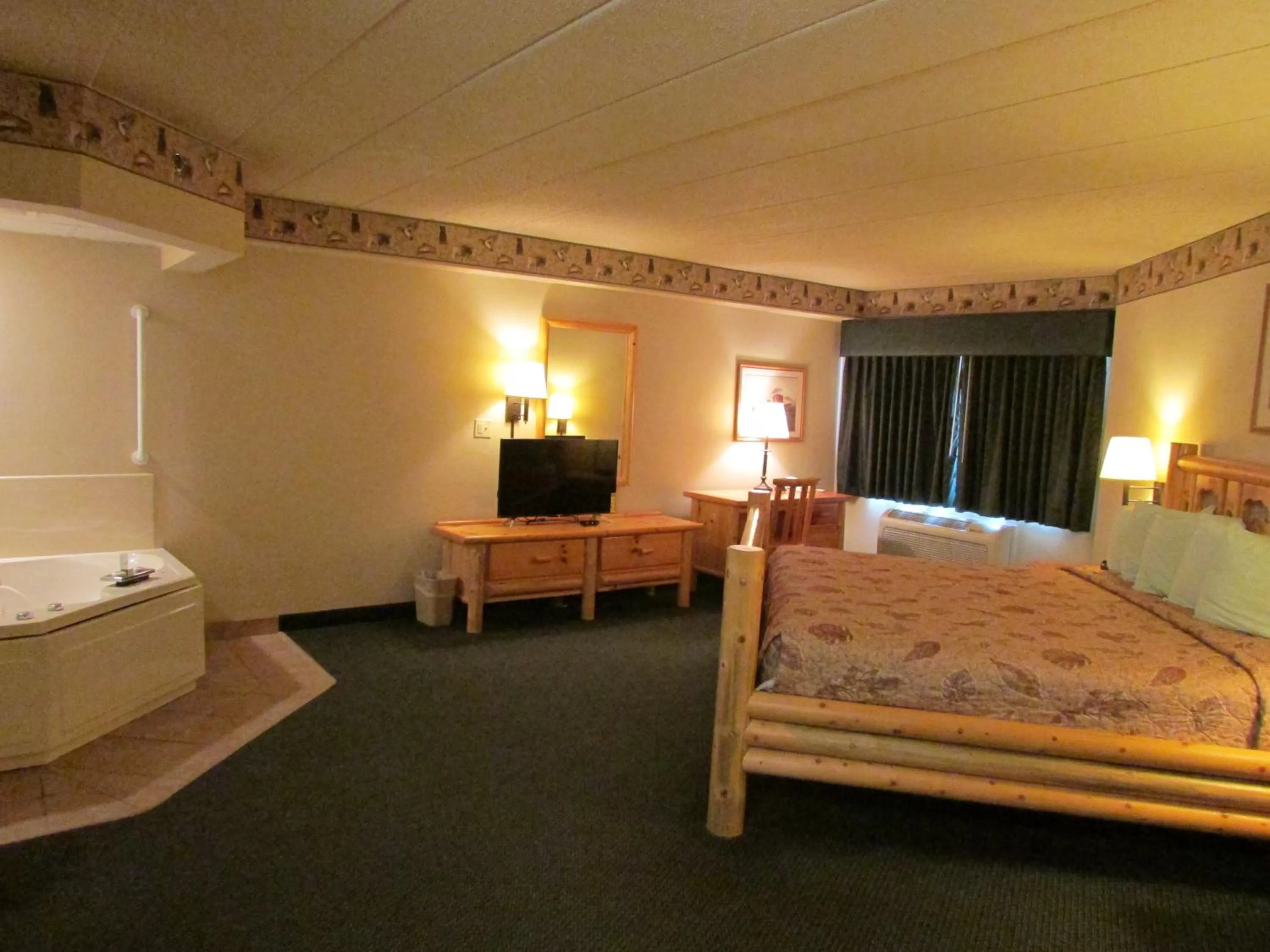 Photo of the whole room, Bed in Shell Lake Lodge, a Travelodge by Wyndham
