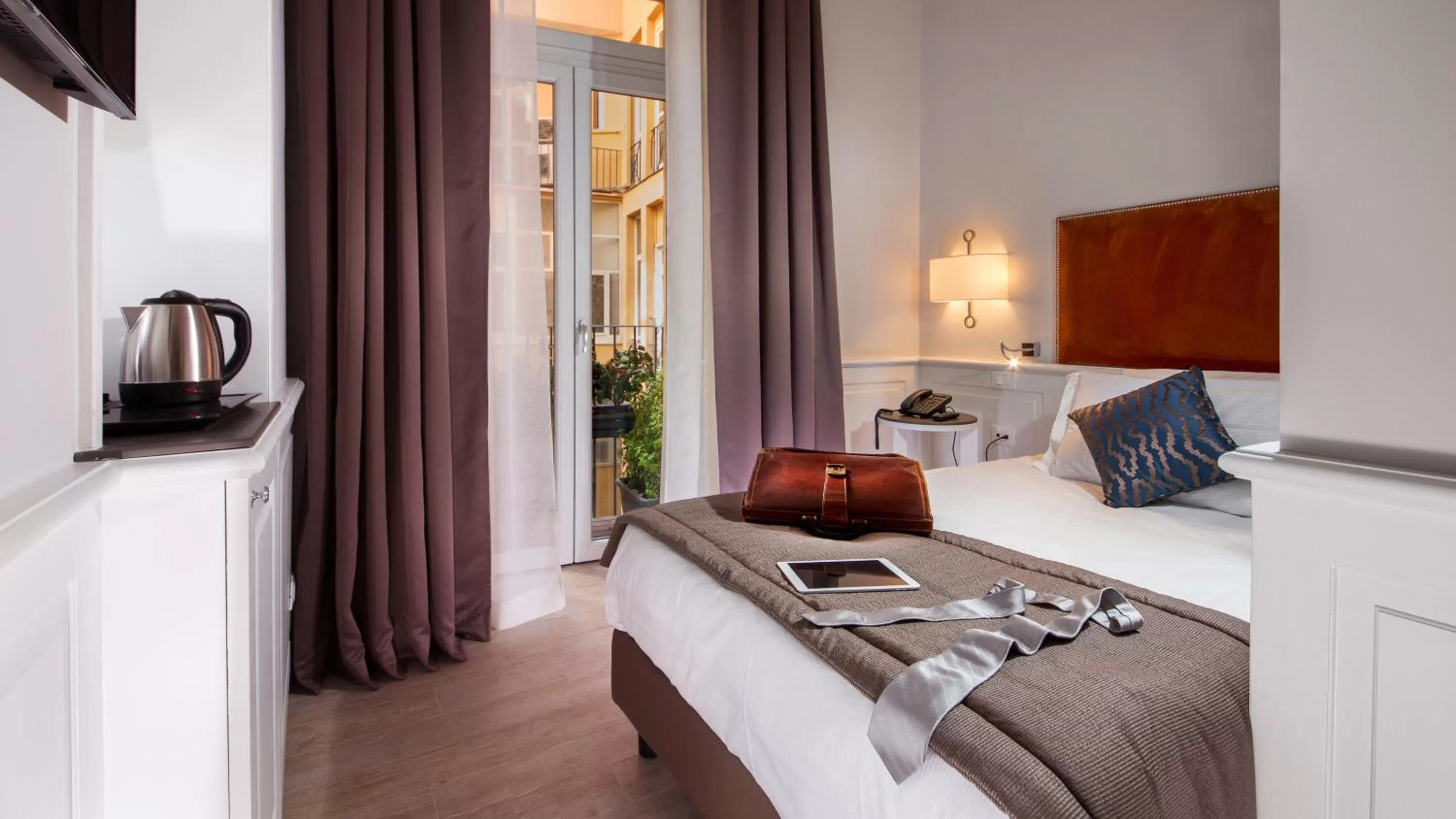 Bed in Princeps Boutique Hotel