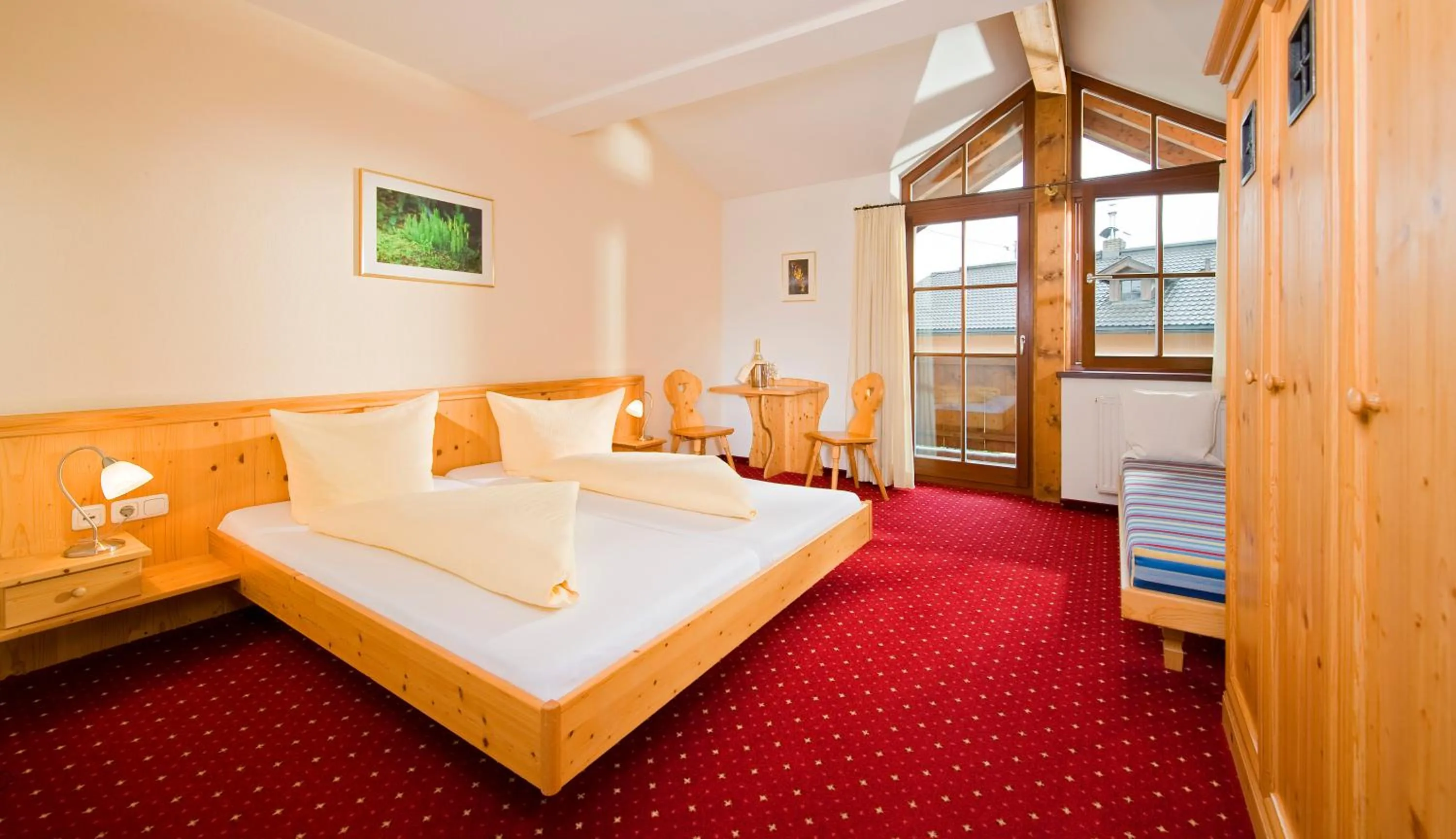 Photo of the whole room, Bed in Hotel Reitlwirt