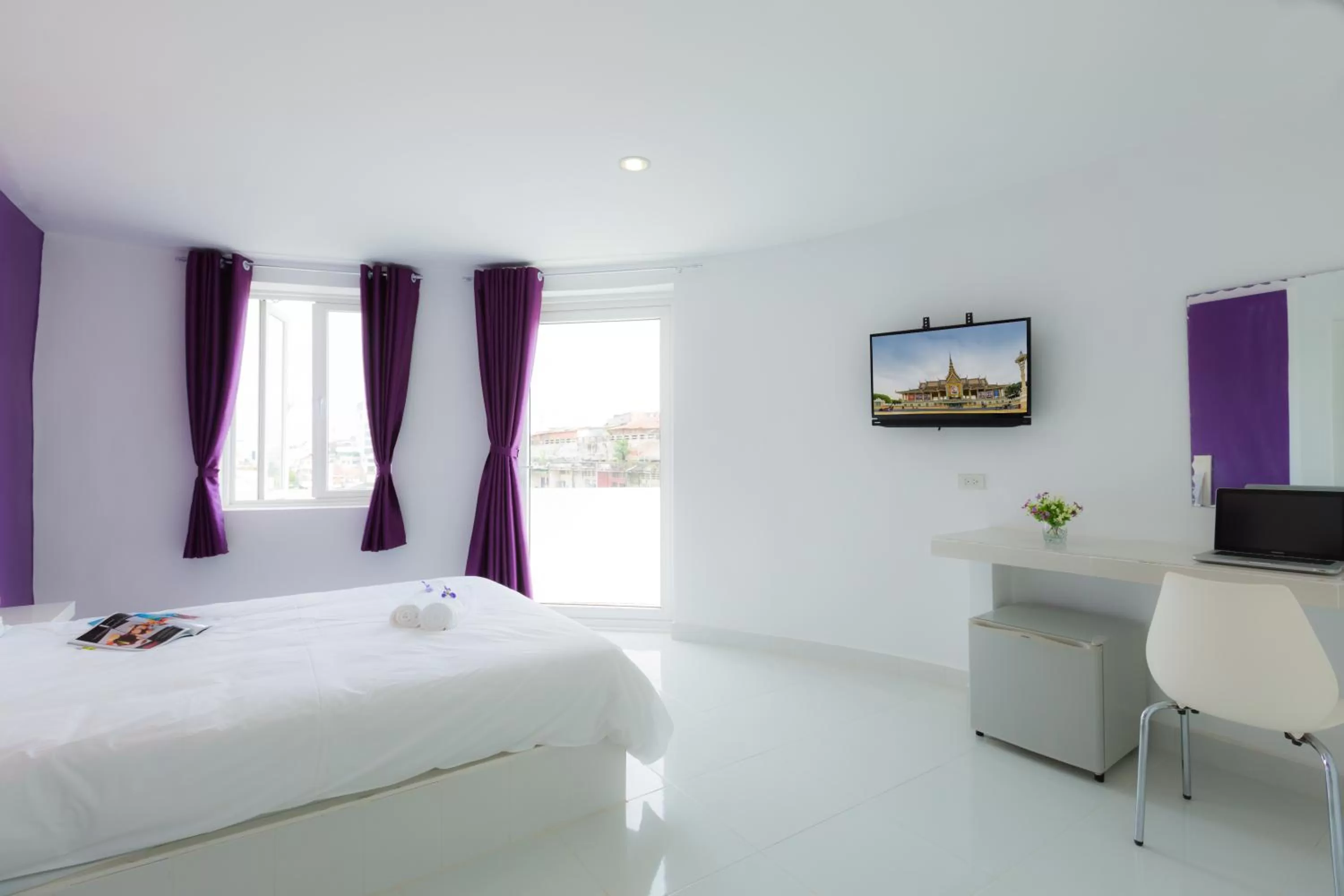 Photo of the whole room, TV/Entertainment Center in Hotel Zing Phnom Penh