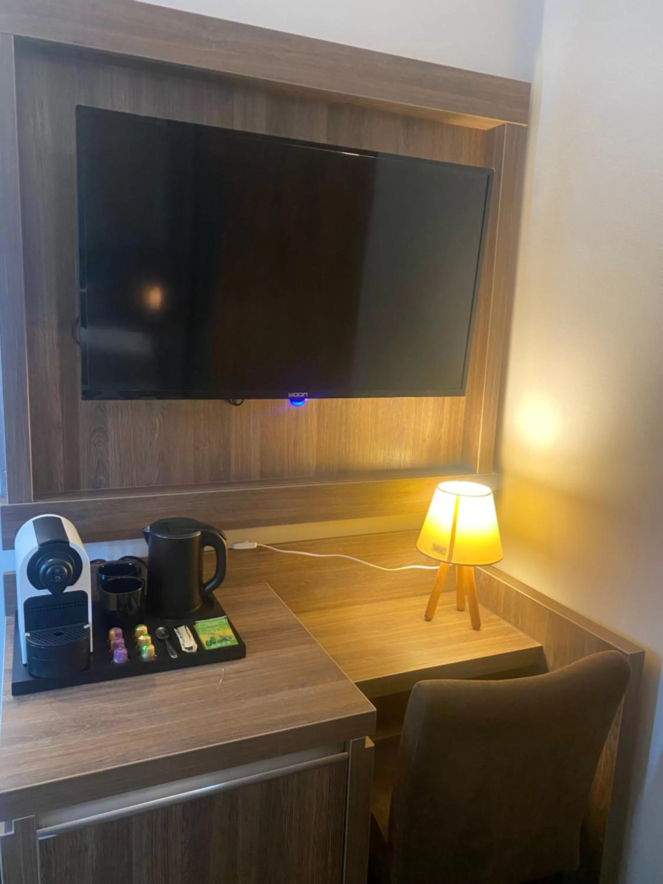 Communal lounge/ TV room in Hotel Cataleya