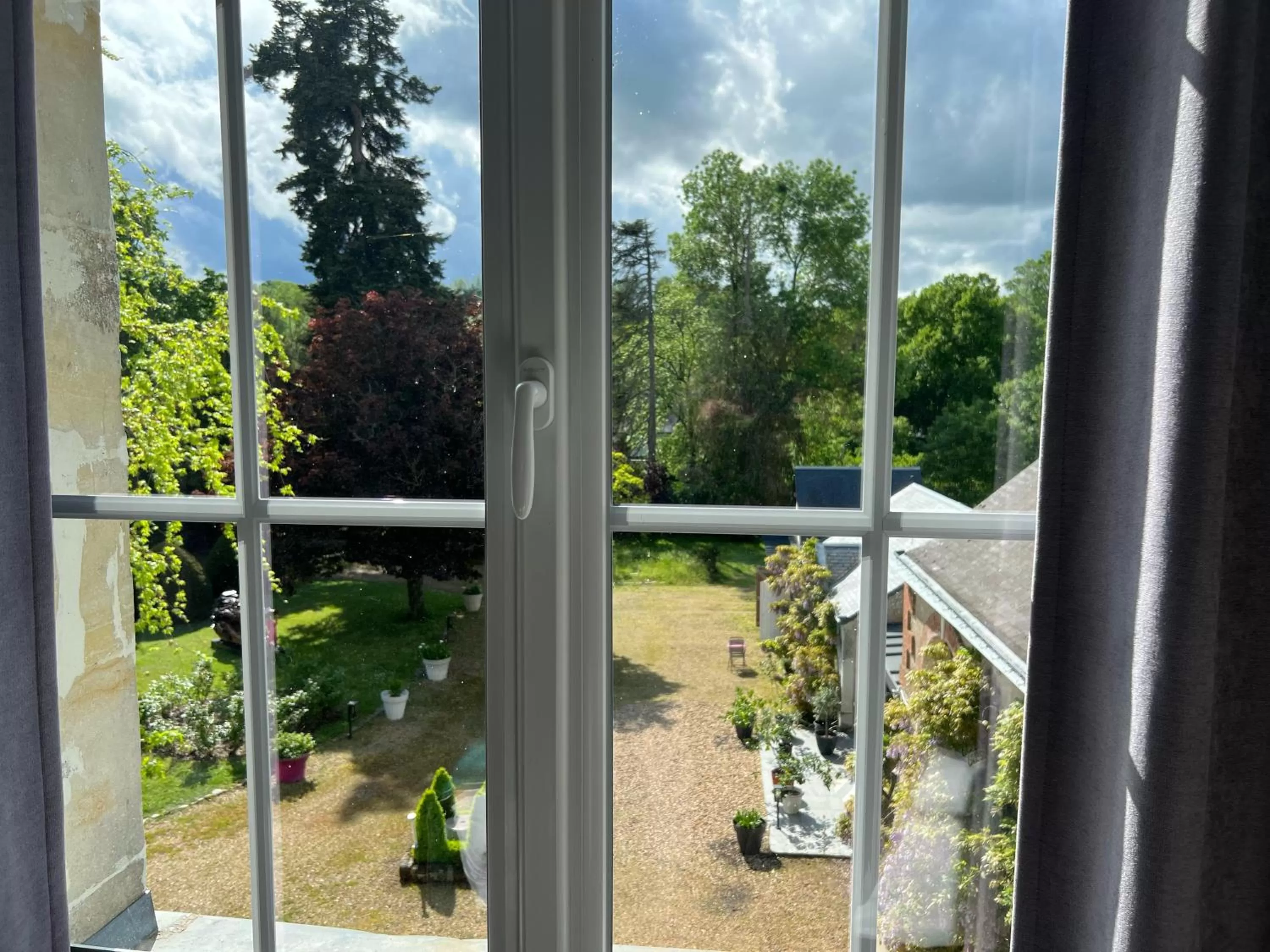 Garden in Chambres d'hôtes & Spa Les Perce Neige