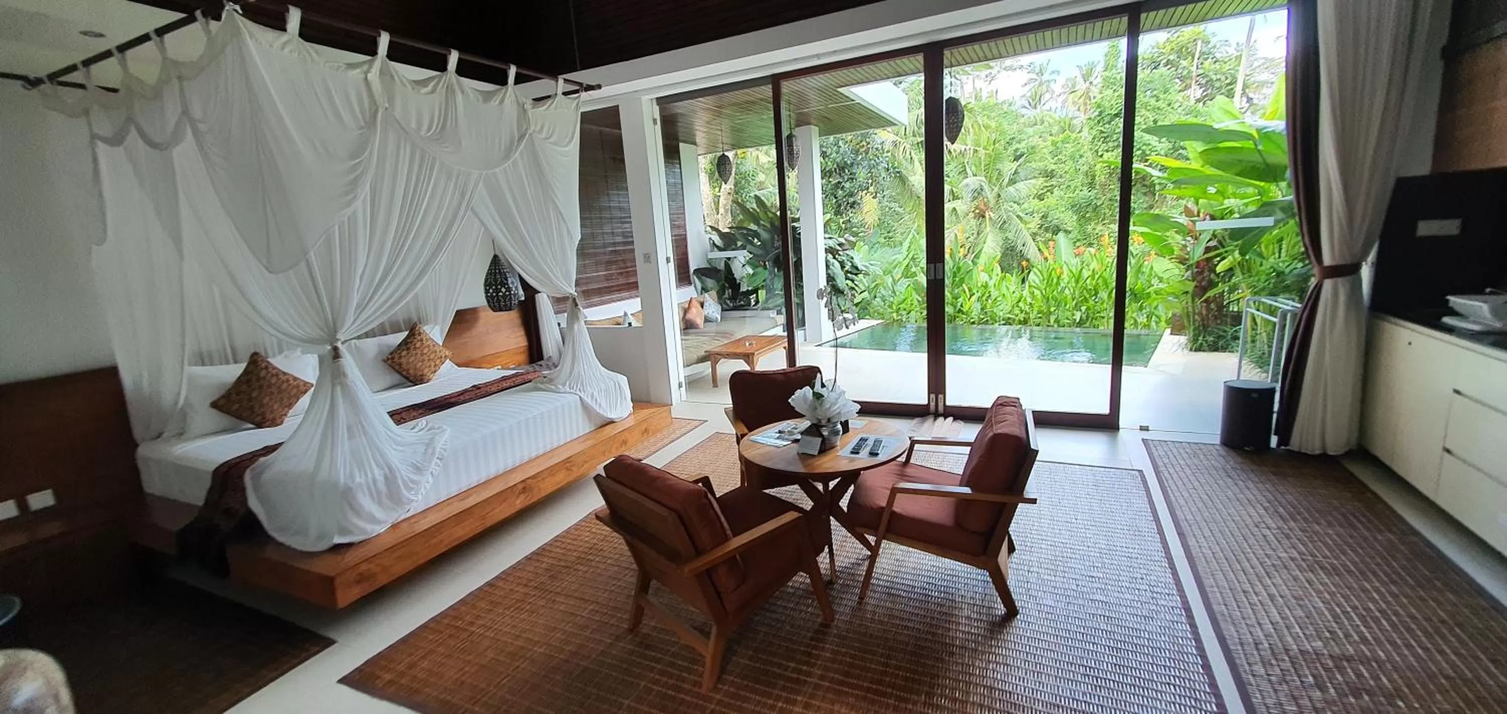 Seating area, Bed in Cahaya Indah Villas