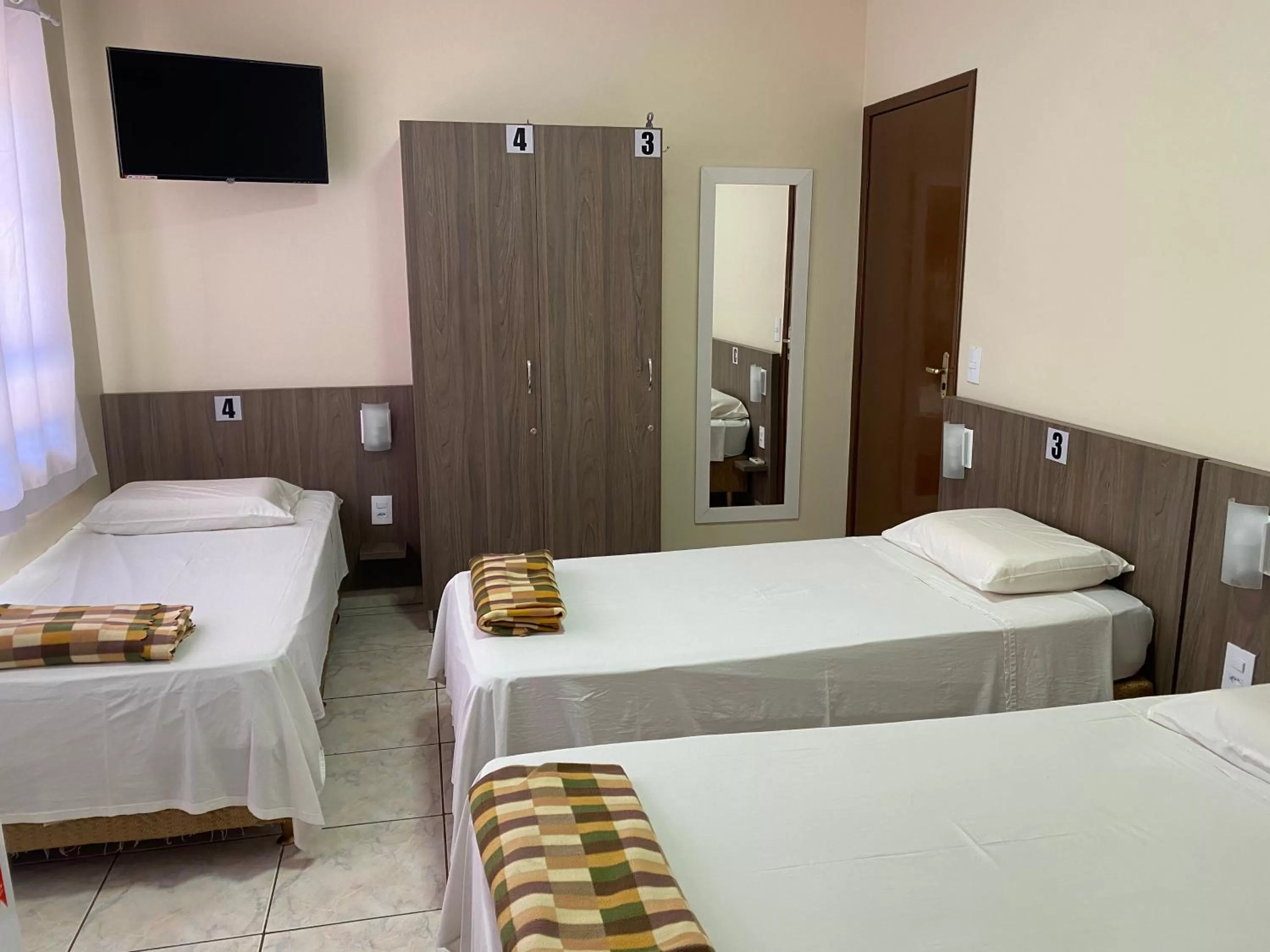 Bed in Pousada El Shaddai