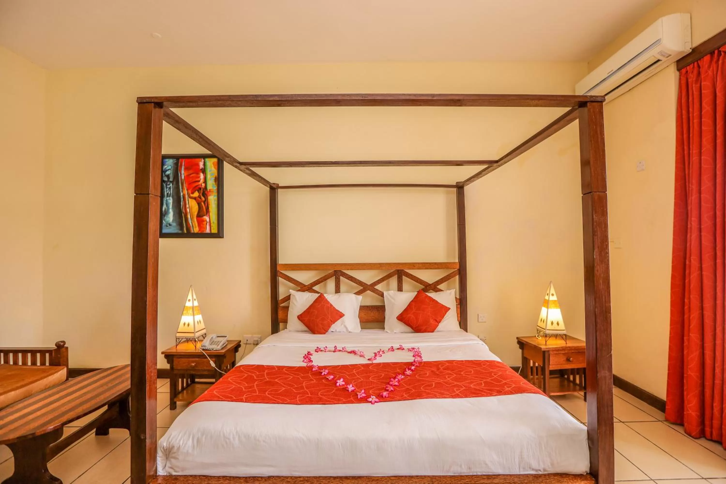 Bed in CityBlue Creekside Hotel & Suites