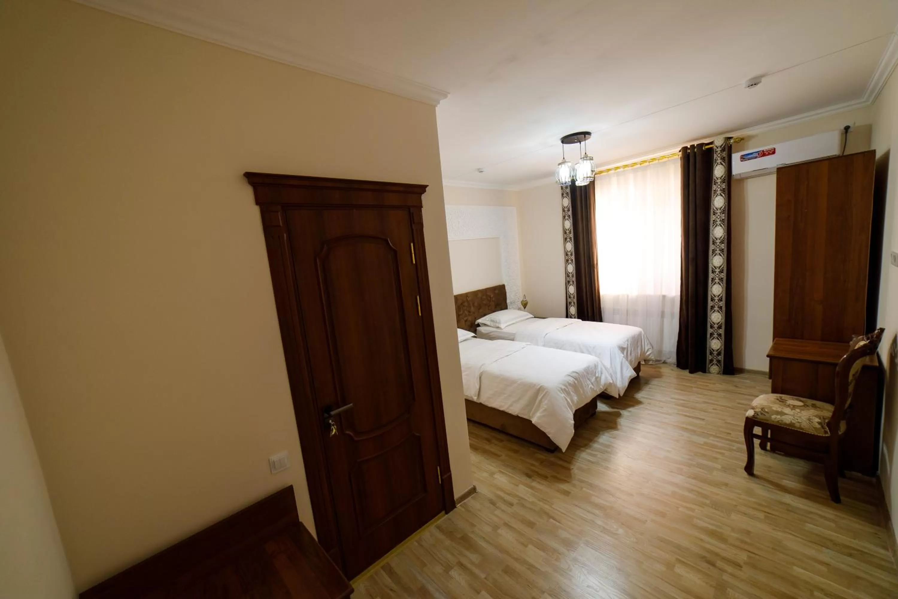 Bed in Khans Palace Hotel