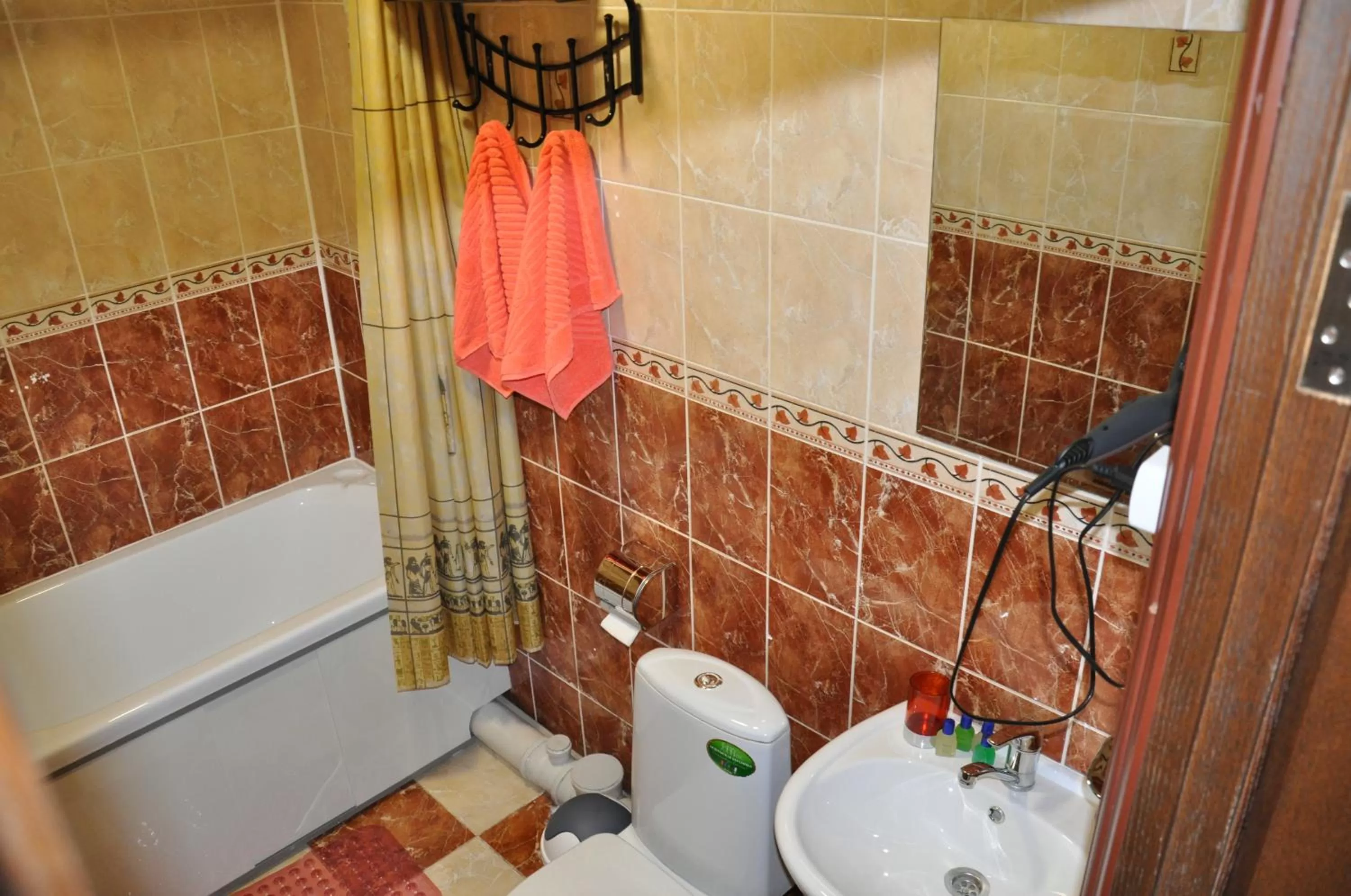 Bathroom in Astina Hotel