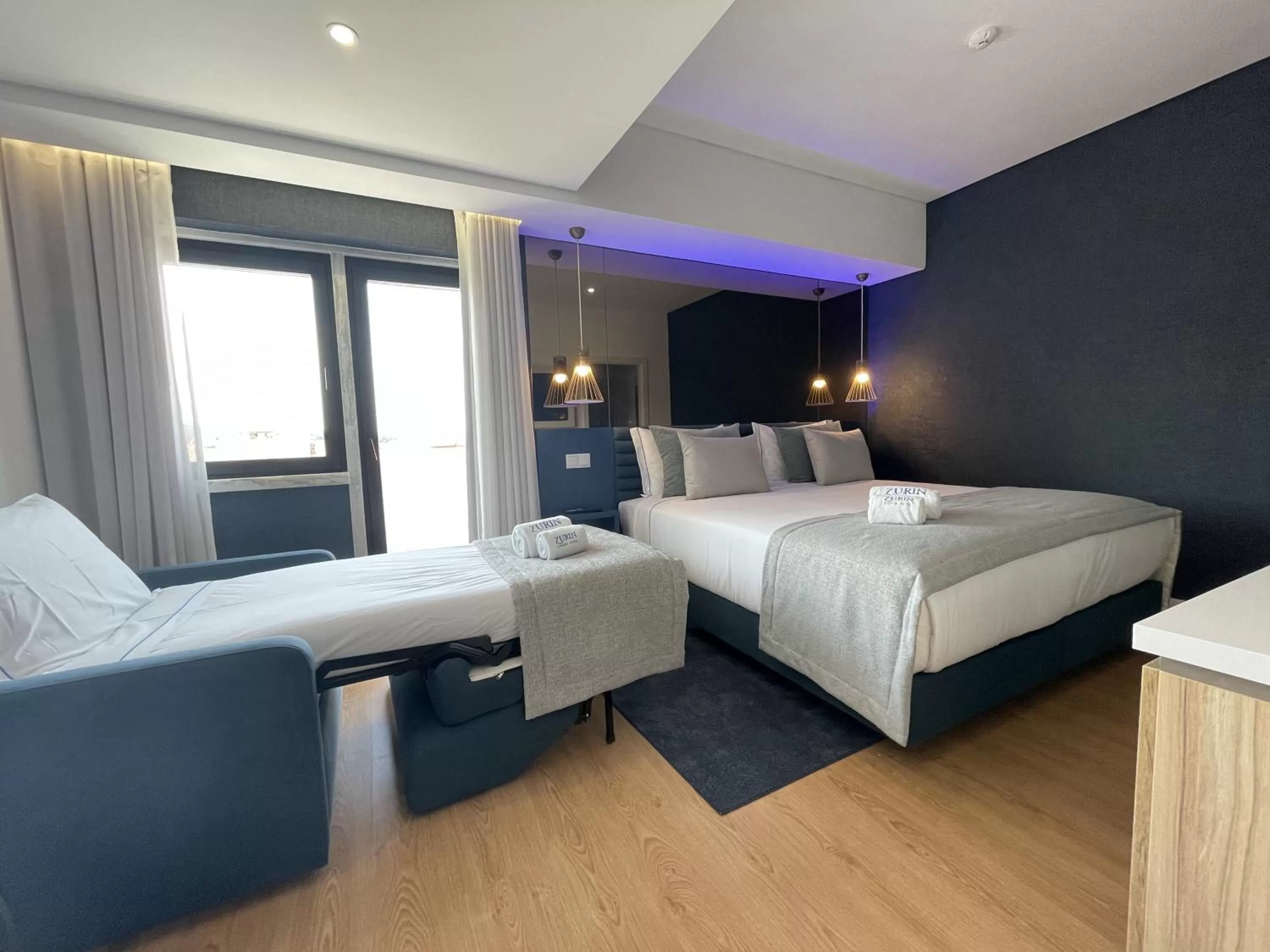 Bed in Zurin Charm Hotel