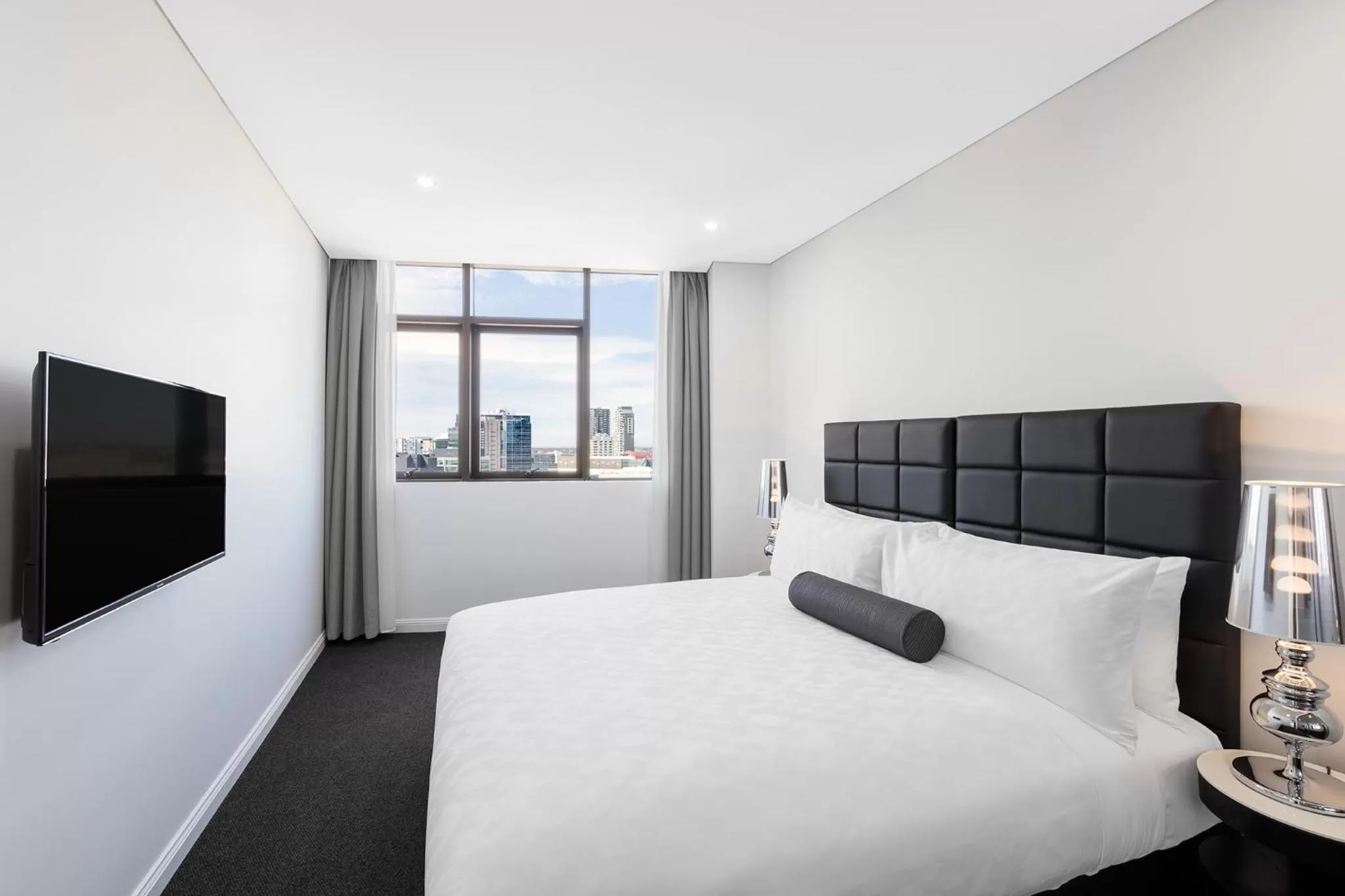 Bed in Meriton Suites Church Street, Parramatta