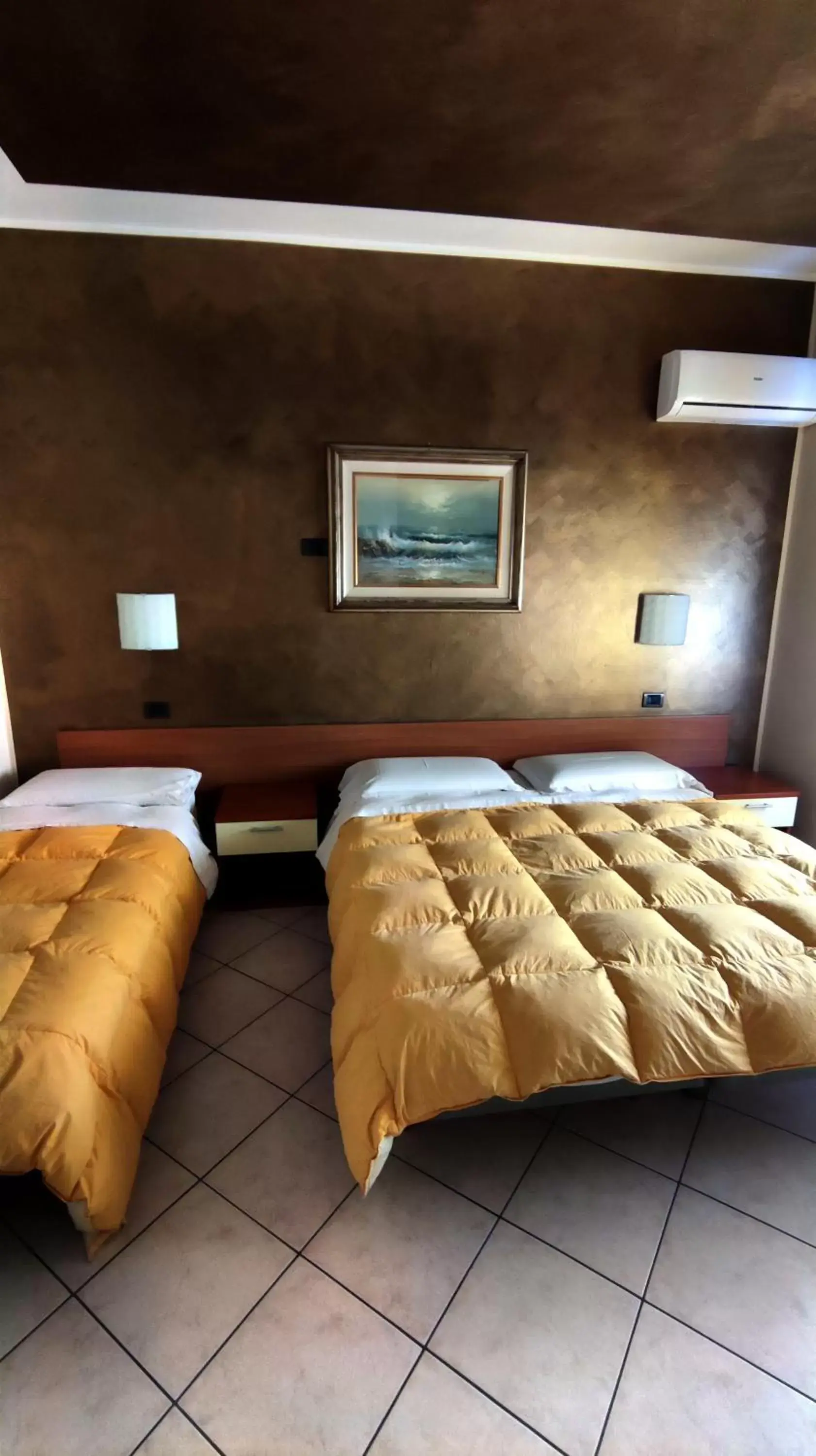 Triple Room in Hotel Emiliana Triple Room in Hotel Emiliana