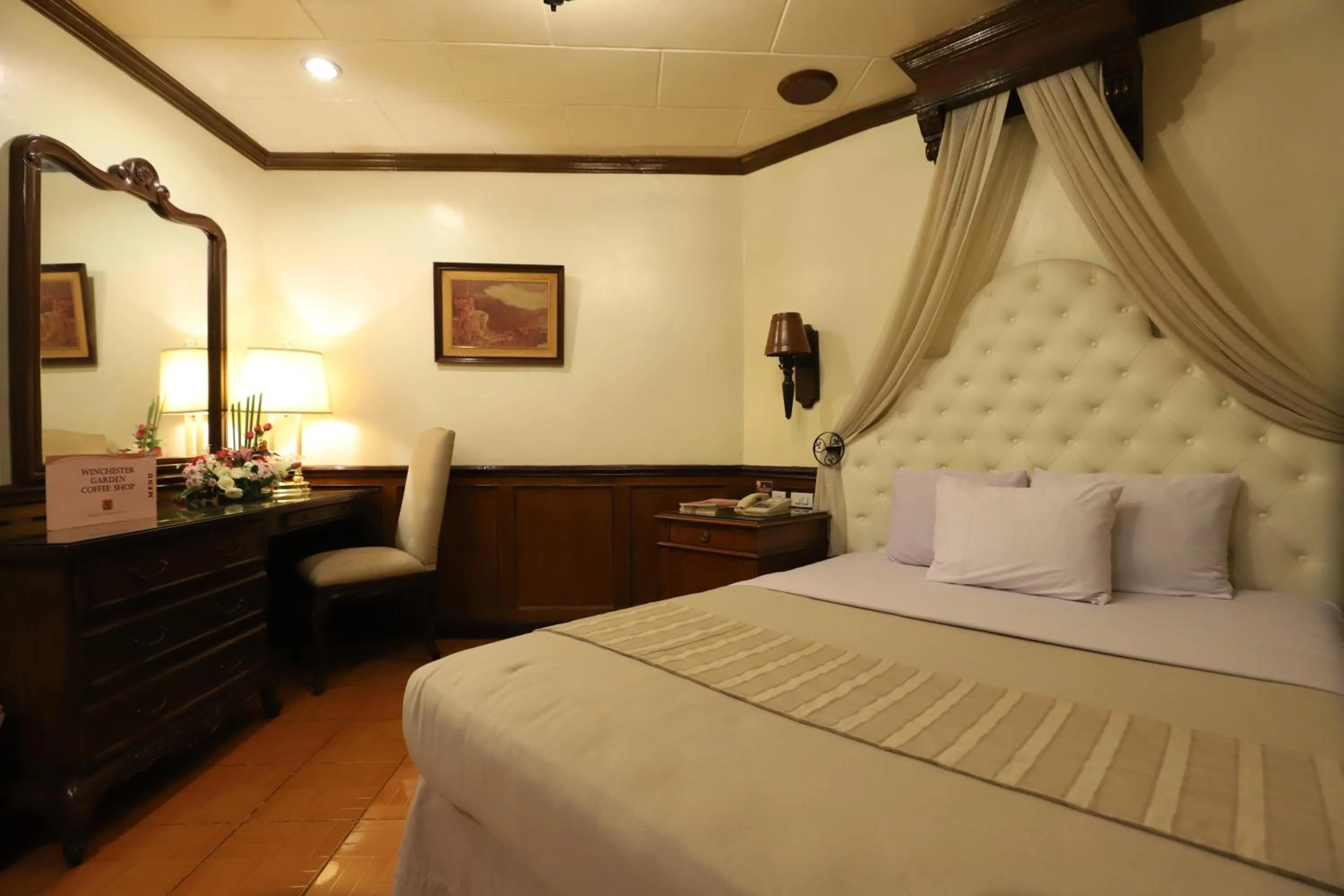 Bed in Camelot Hotel