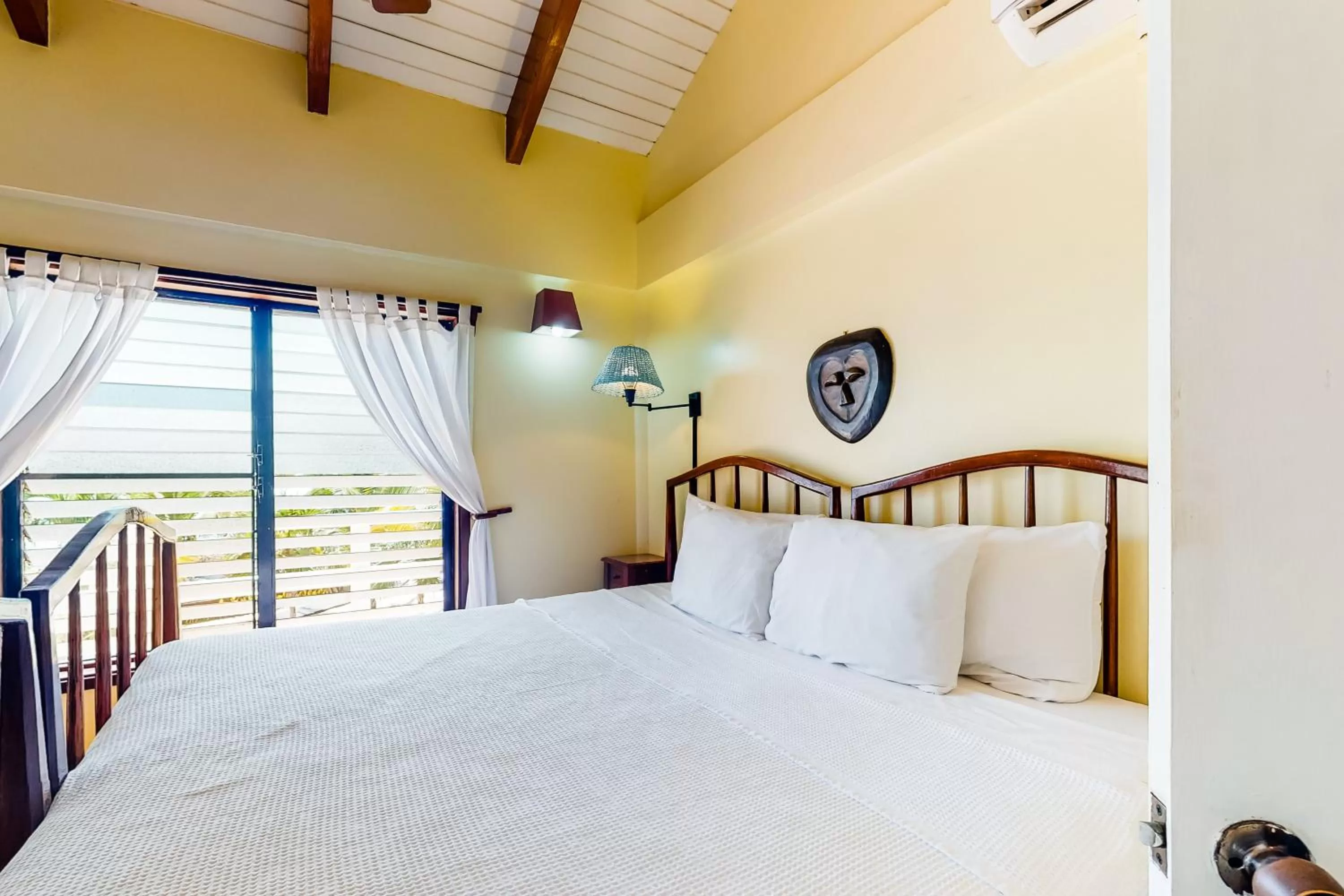 Bed in Condo #26 @ Beachside Villas
