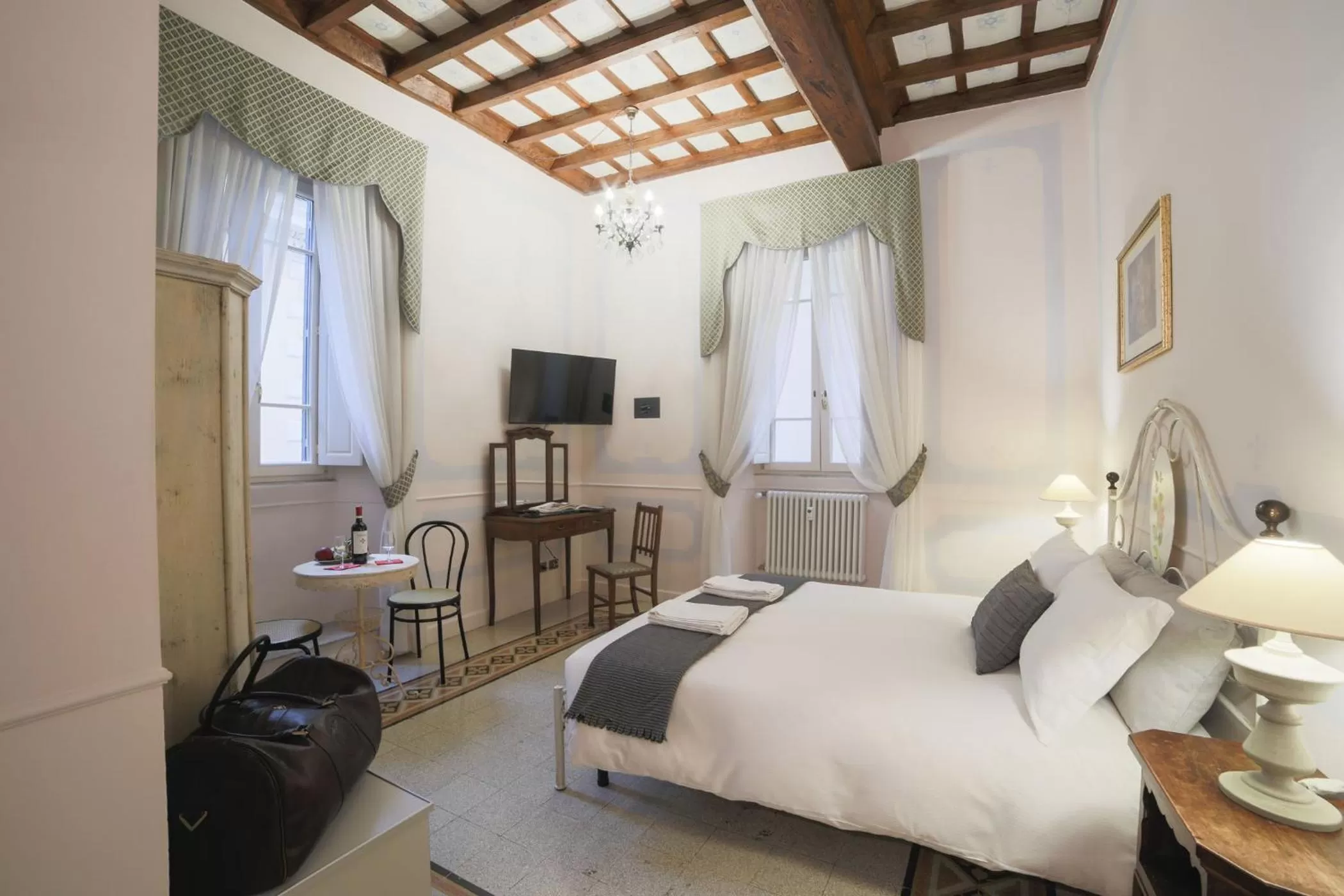 Photo of the whole room, Bed in La Maison Dell'Orologio