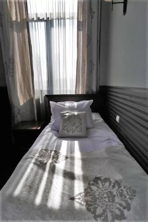 Bed in Hotel Neptun