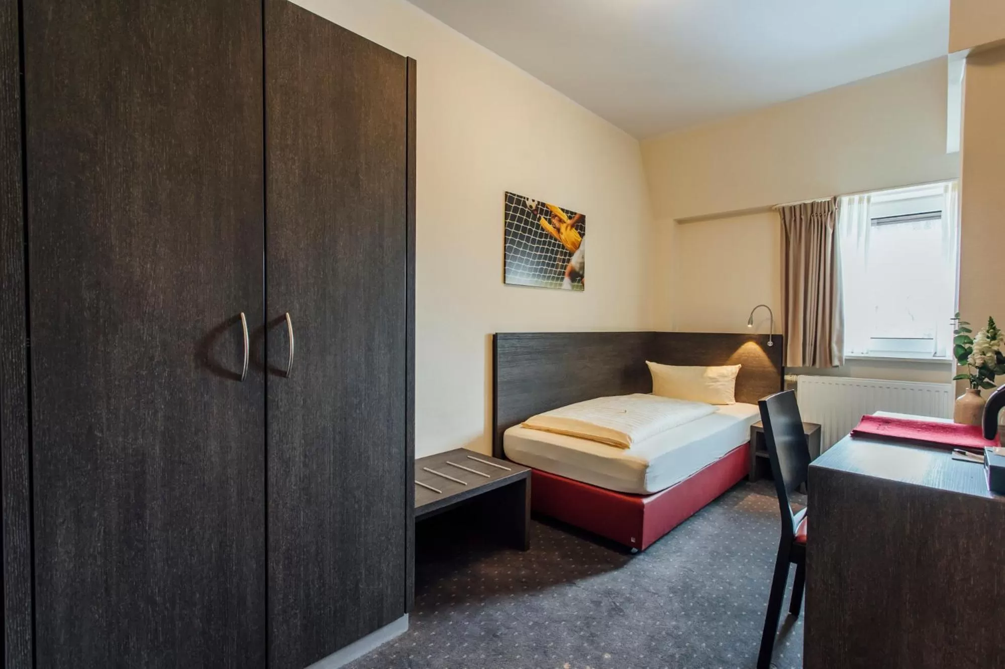 Photo of the whole room, Bed in Hotel Bloemfontein