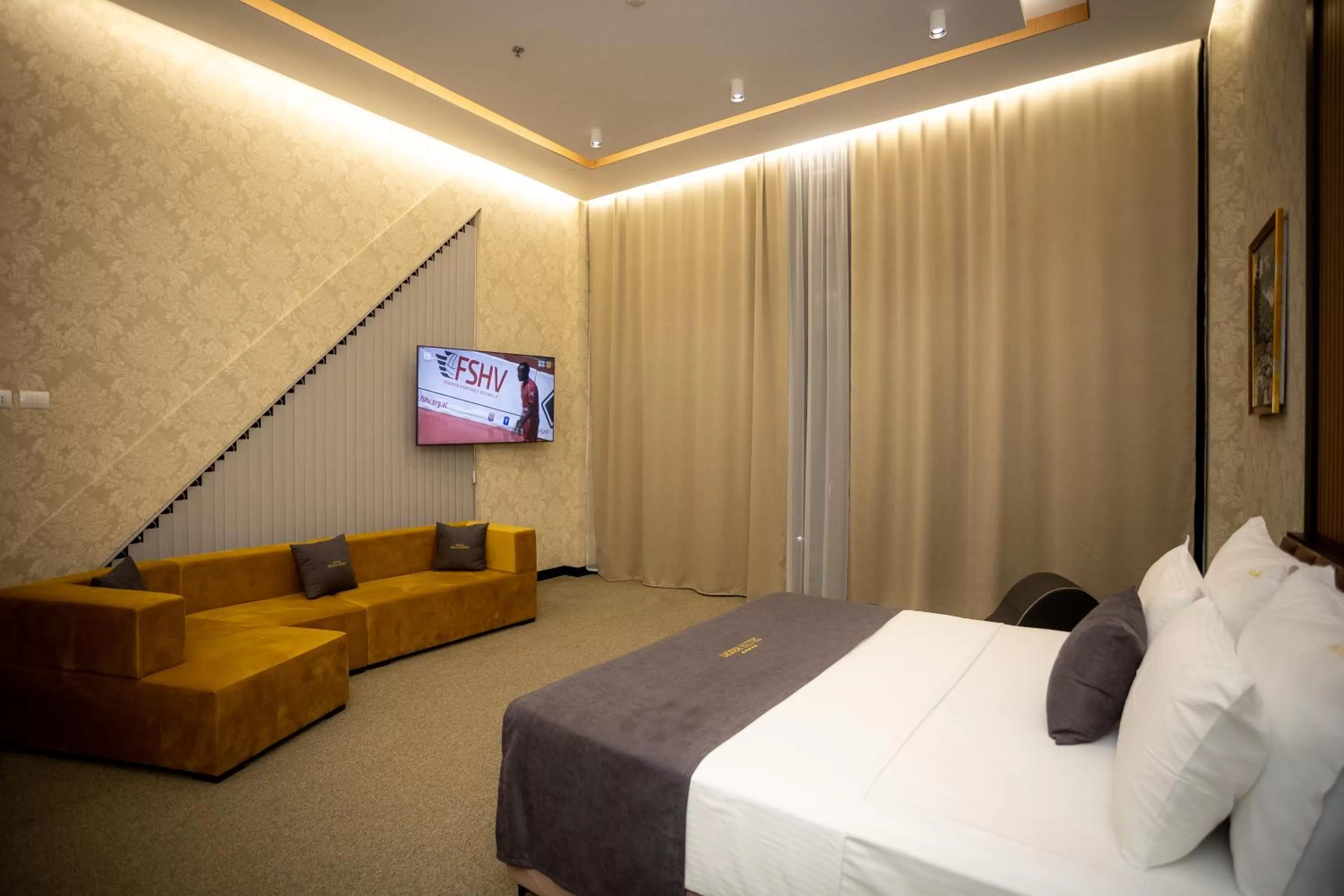 Bedroom, TV/Entertainment Center in Deluxe Resort and SPA
