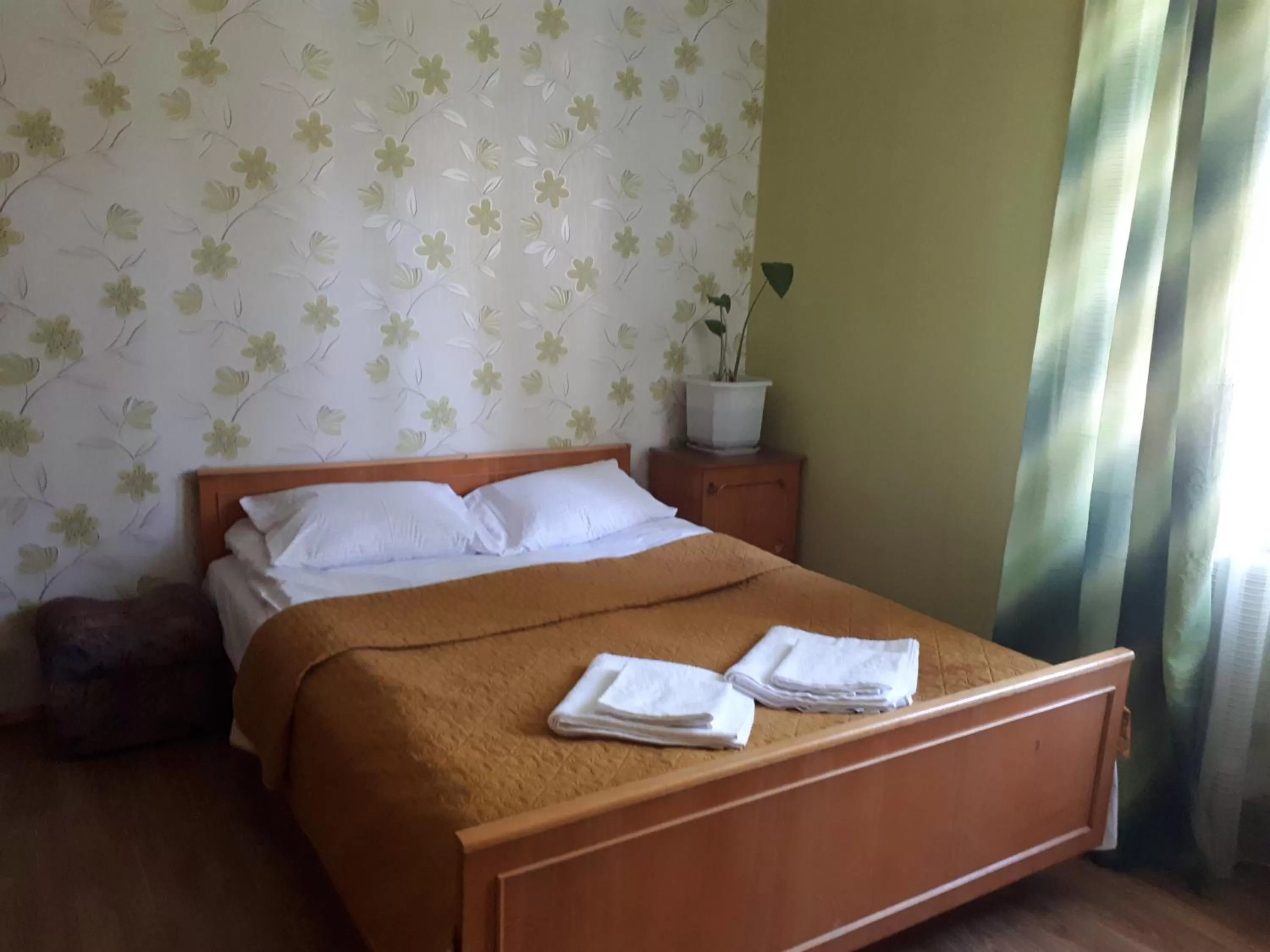 Bed in Hotel Gostynnyi Dvir