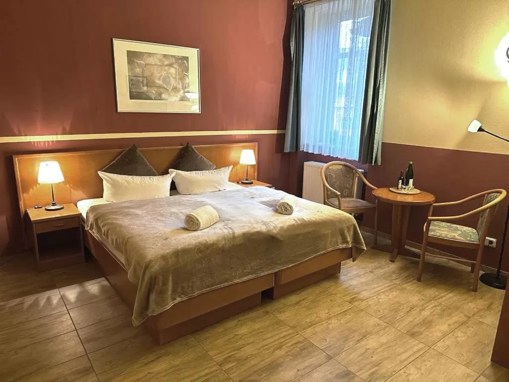 Bed in Altstadthotel Ilsenburg