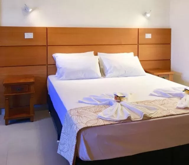 Bed in Pousada Ilha Vitoria